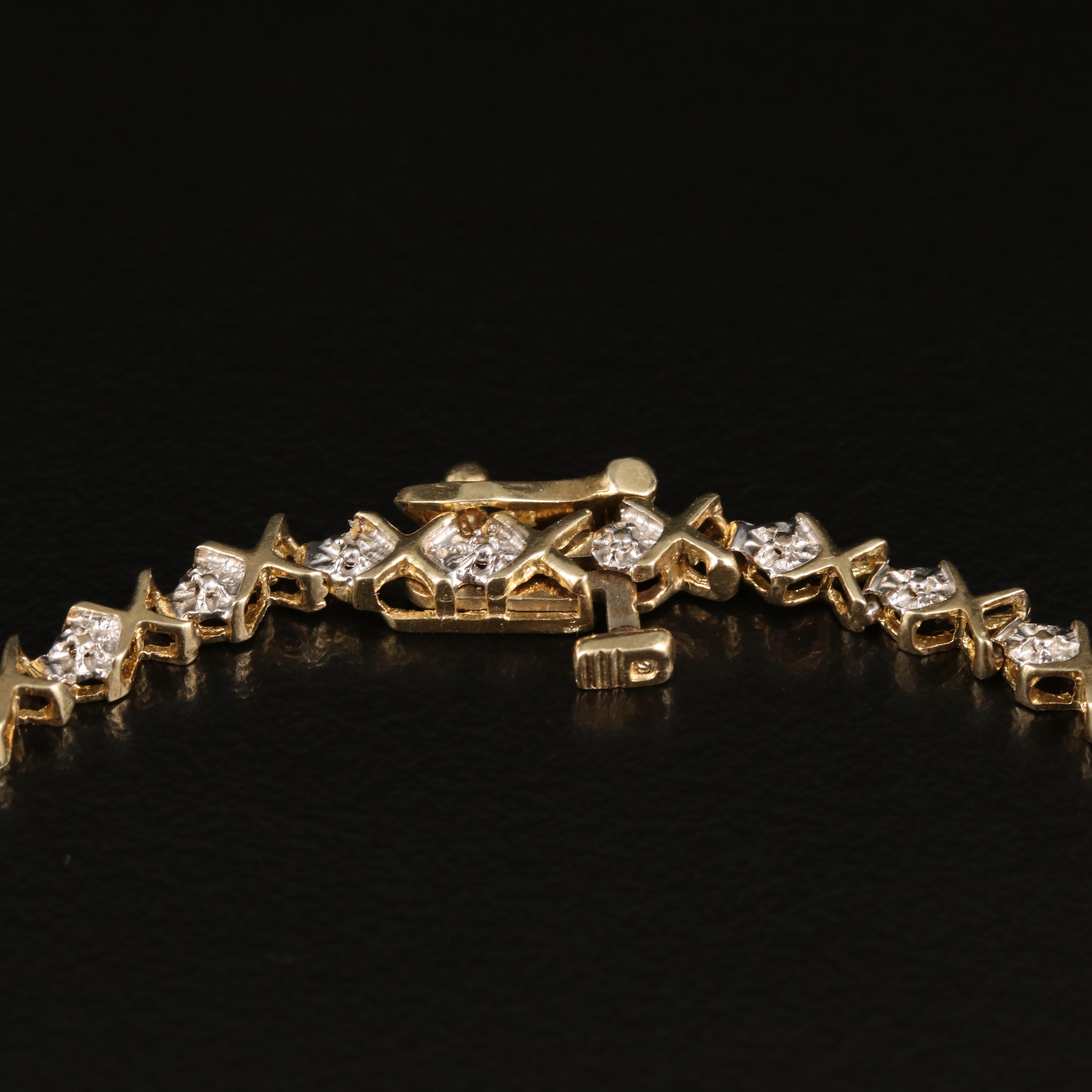 10K 0.08 CTW Diamond "XO" Bracelet