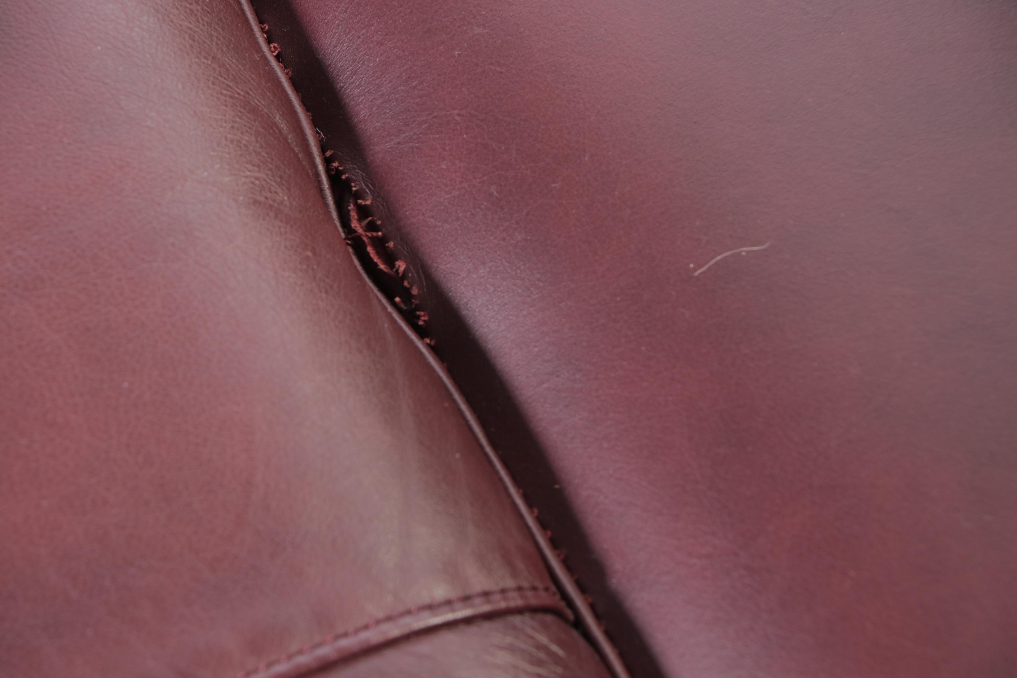 Pair of Burgundy Vinyl Upholstered Overstuffed Armchairs