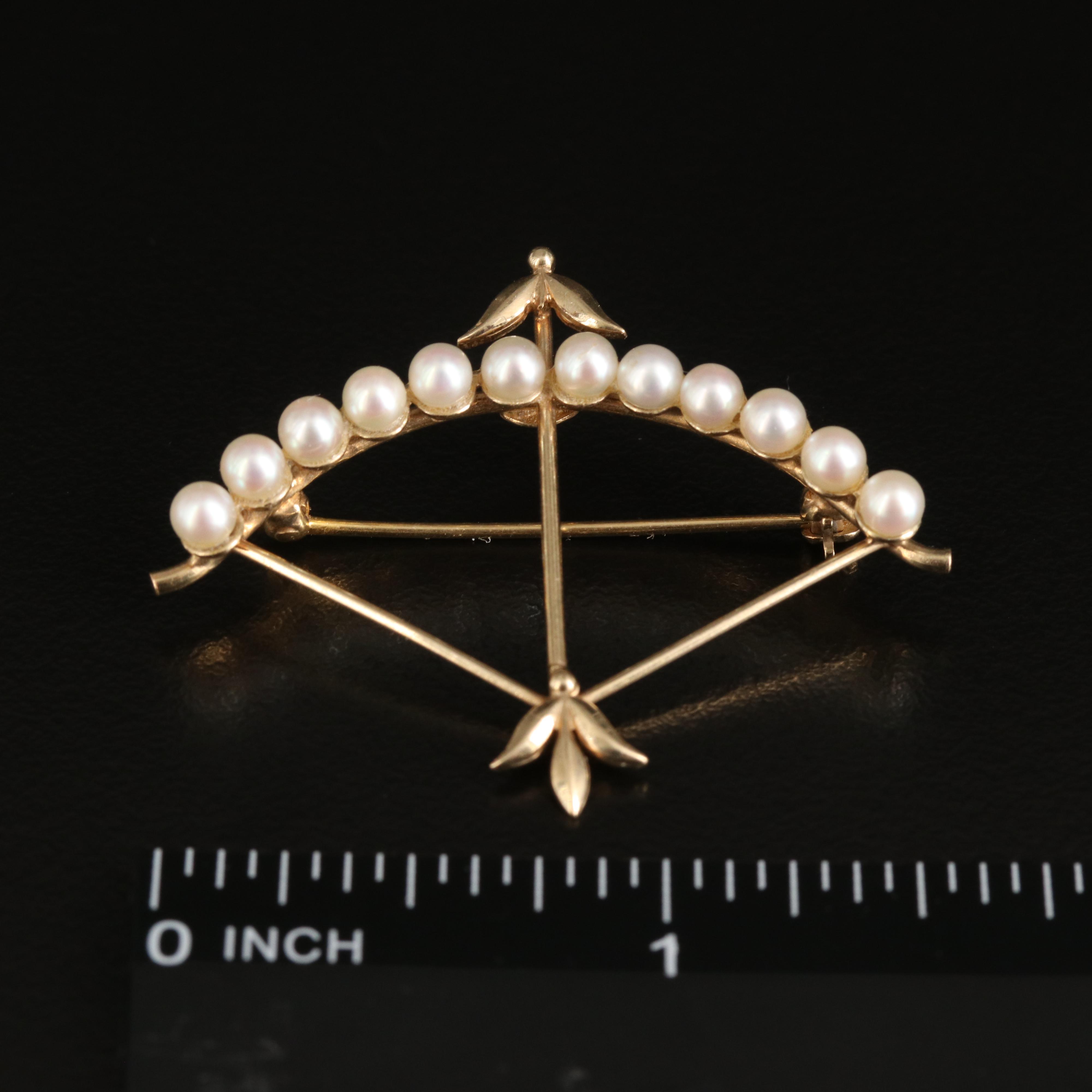 1950s Carl Art Inc. 14K Pearl Bow and Arrow Brooch