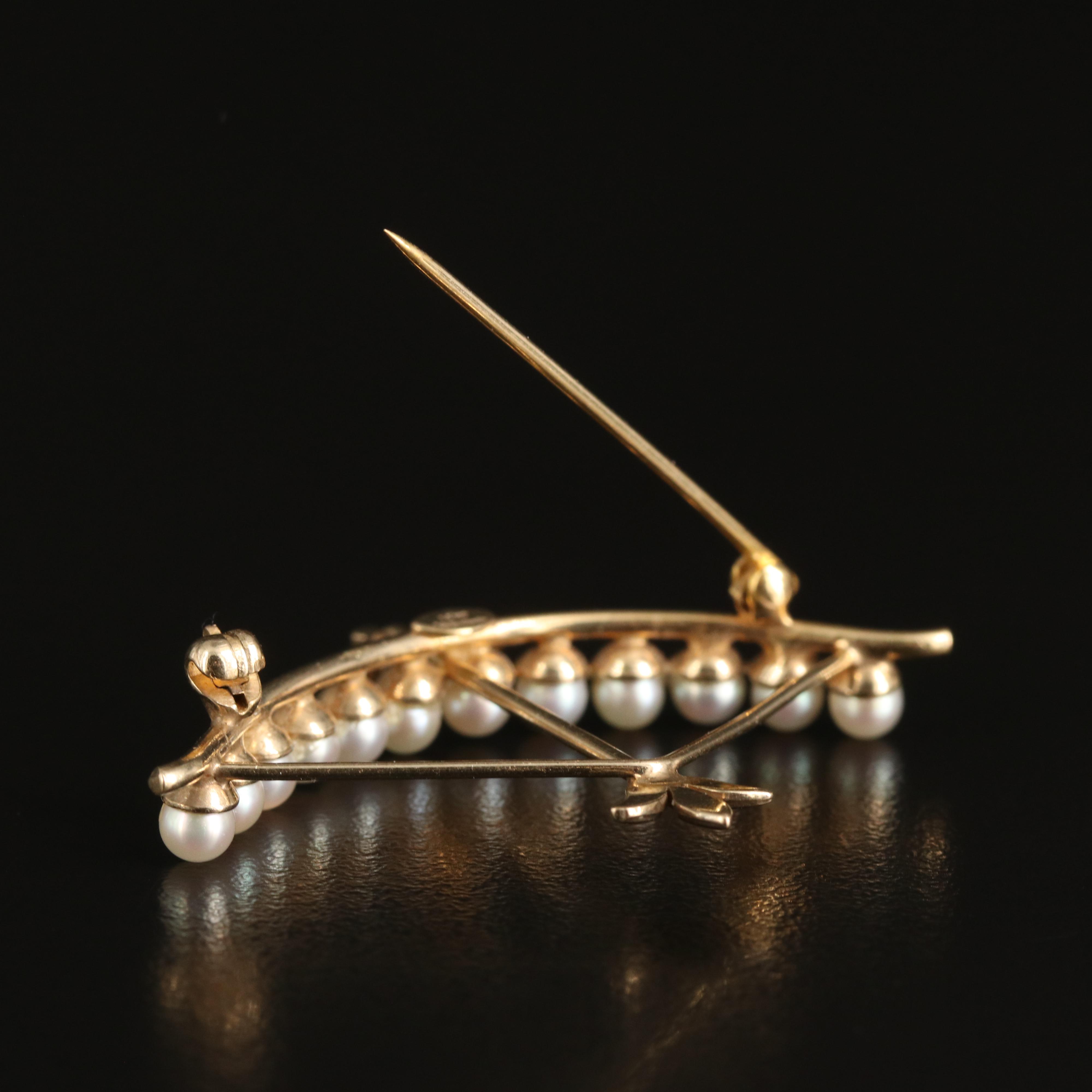 1950s Carl Art Inc. 14K Pearl Bow and Arrow Brooch