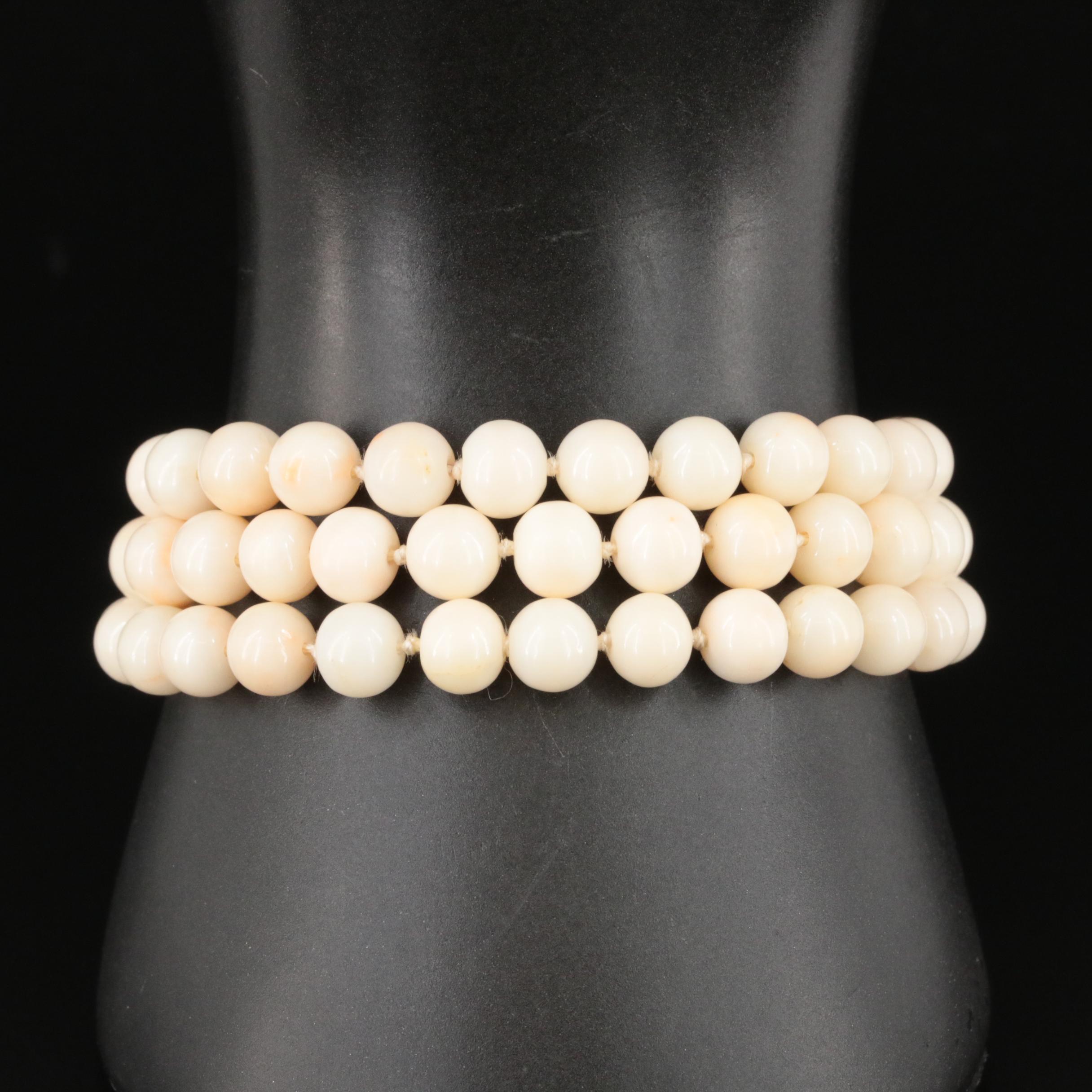 14K Coral Triple Strand Bracelet