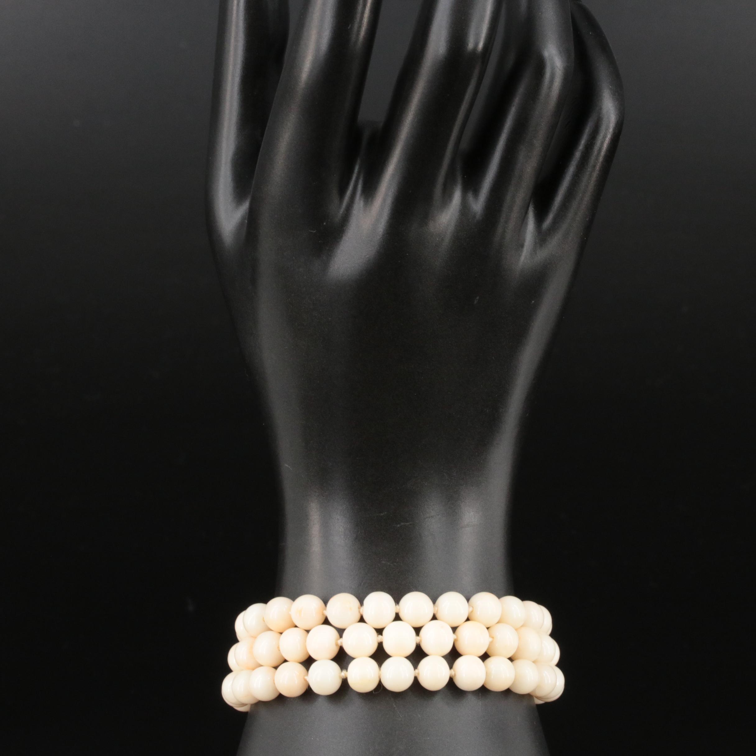 14K Coral Triple Strand Bracelet