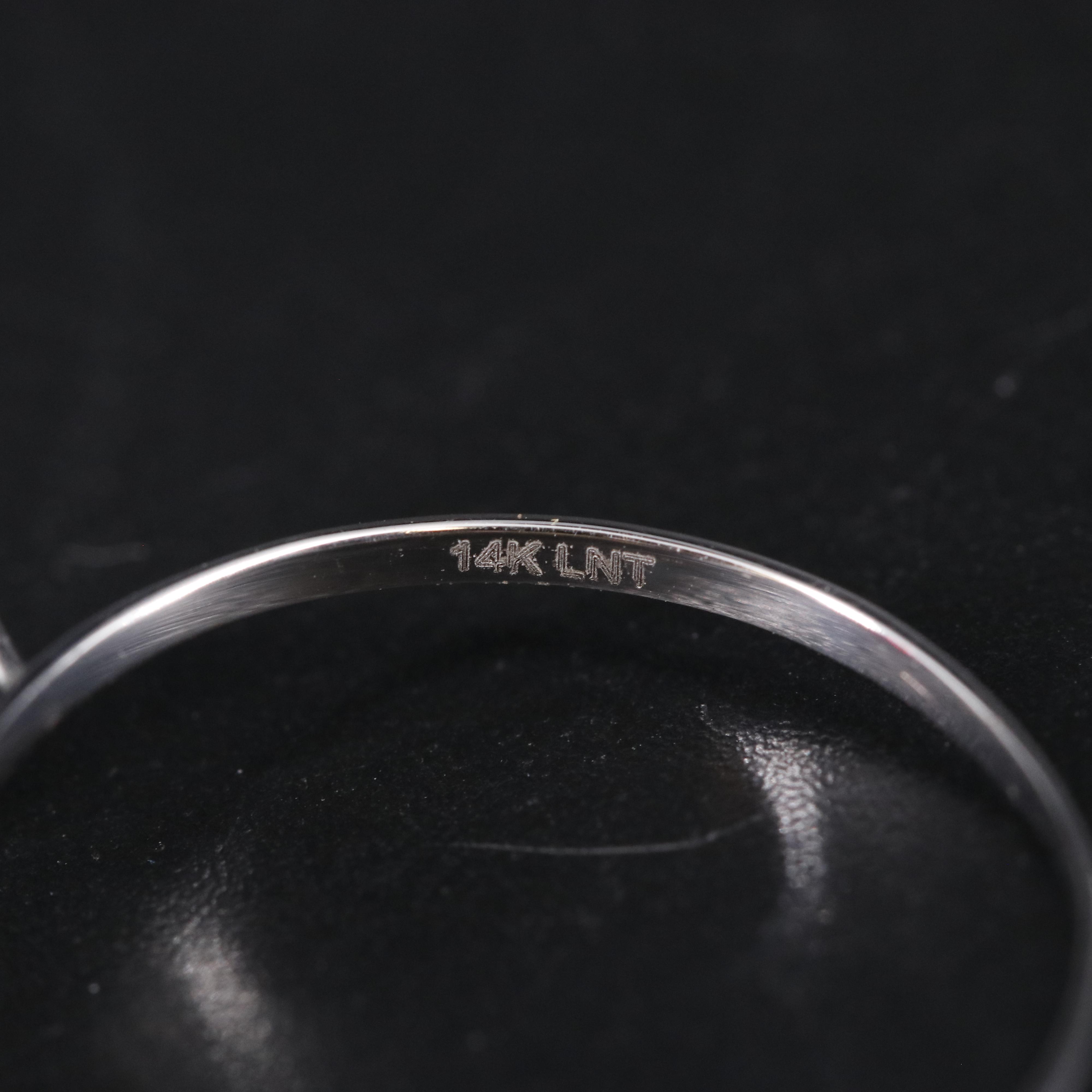 14K Garnet and White Topaz Ring