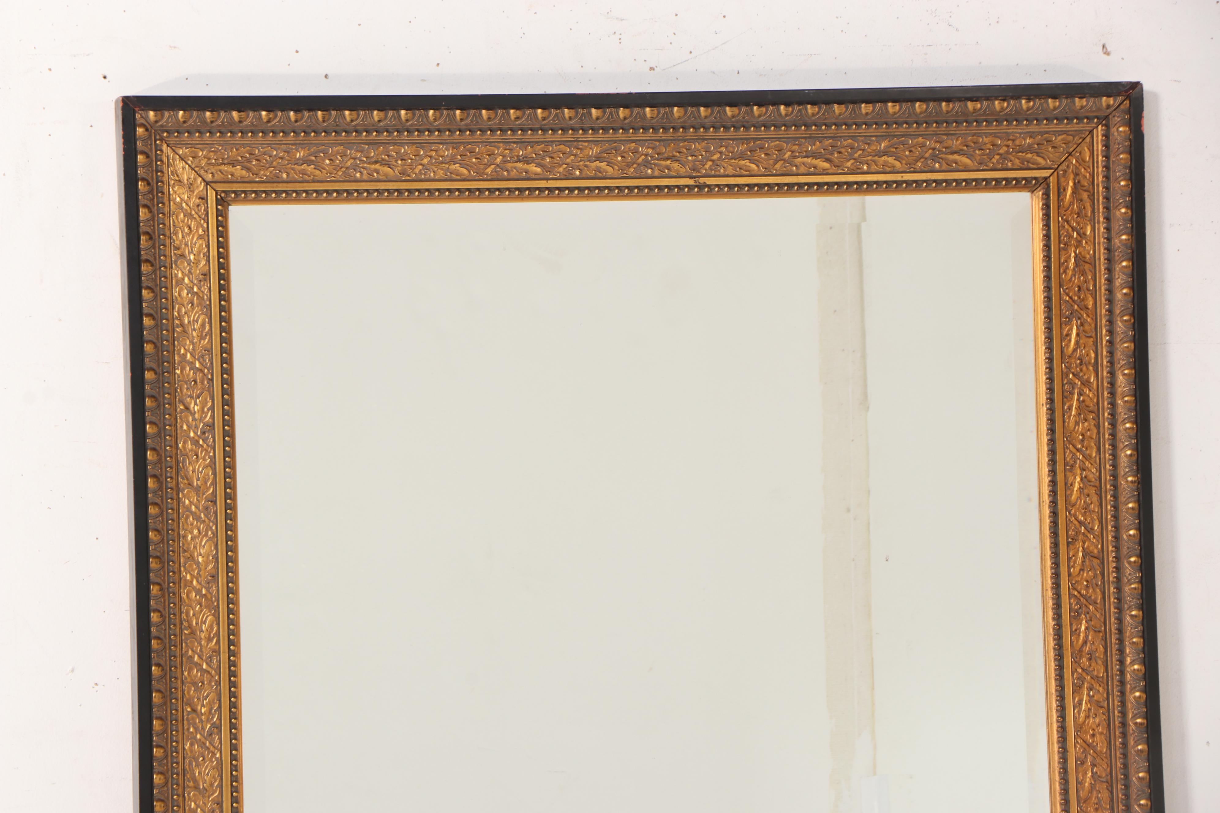 Monumental Carolina Mirror Co. Neoclassical Style Ebonized & Parcel-Gilt Mirror