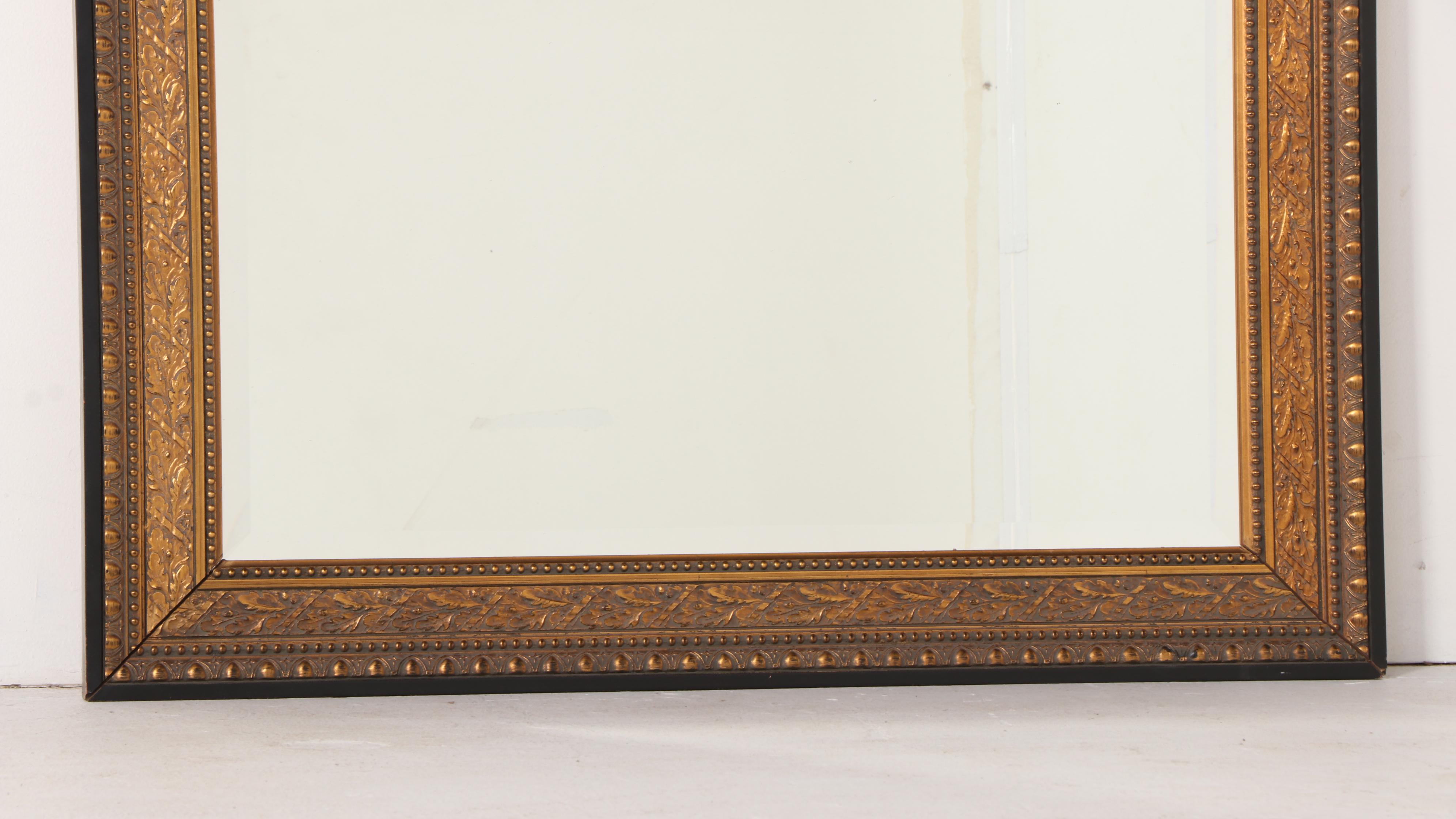 Monumental Carolina Mirror Co. Neoclassical Style Ebonized & Parcel-Gilt Mirror