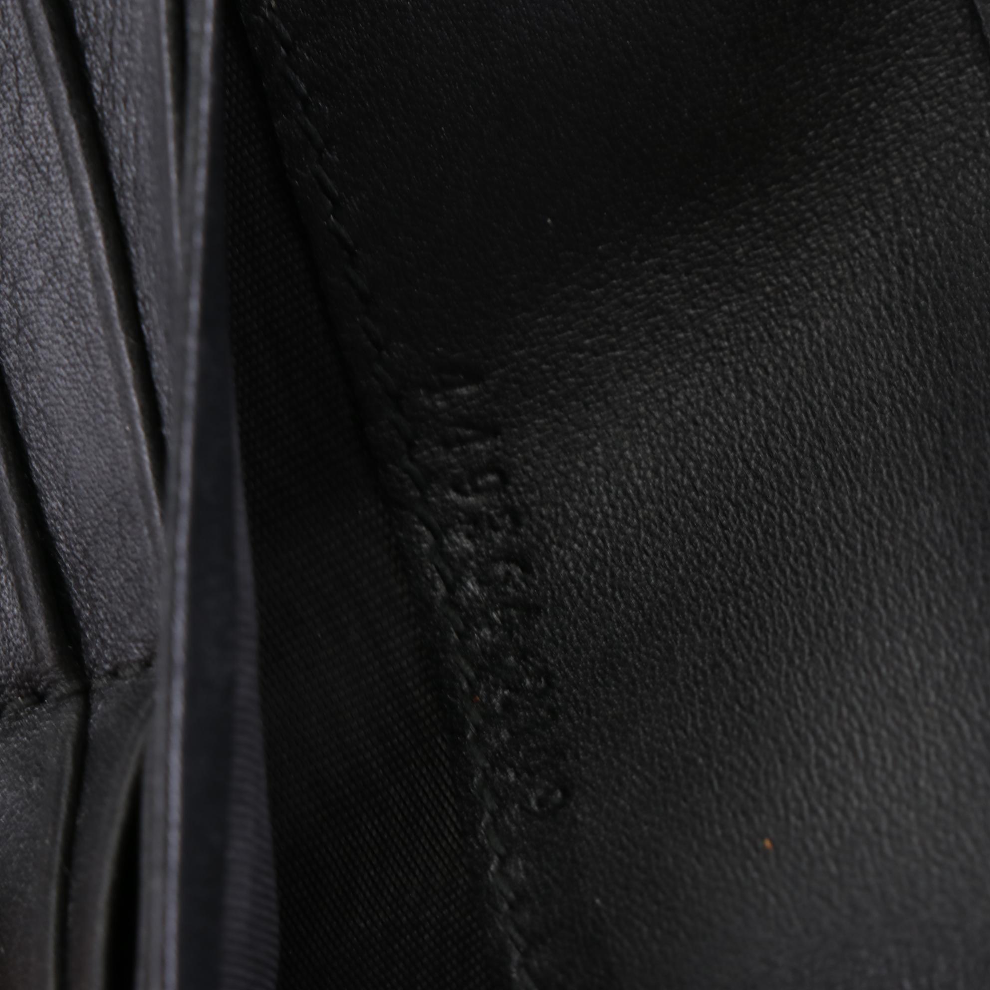 Gucci Continental Wallet in Black Microguccissima Leather