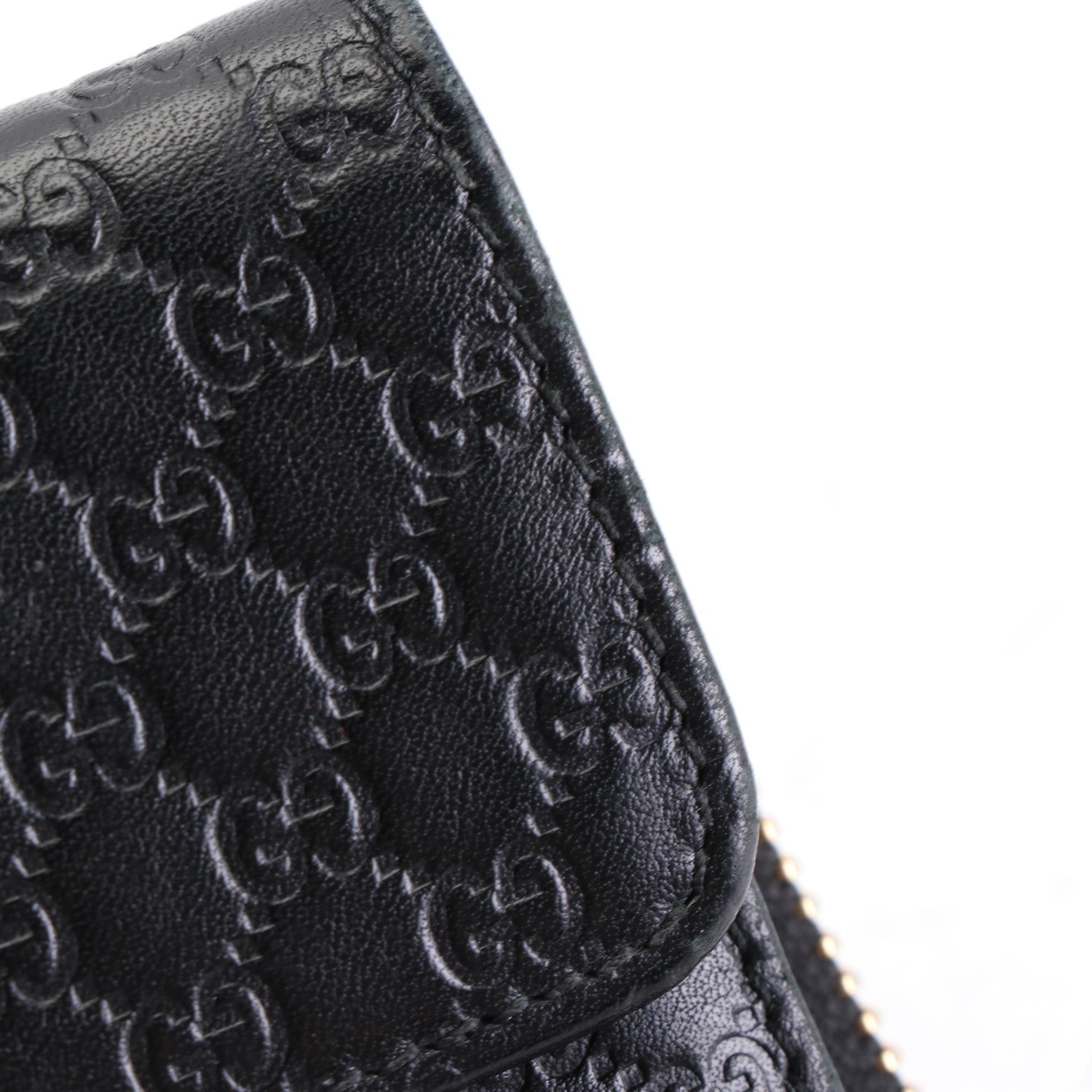 Gucci Continental Wallet in Black Microguccissima Leather
