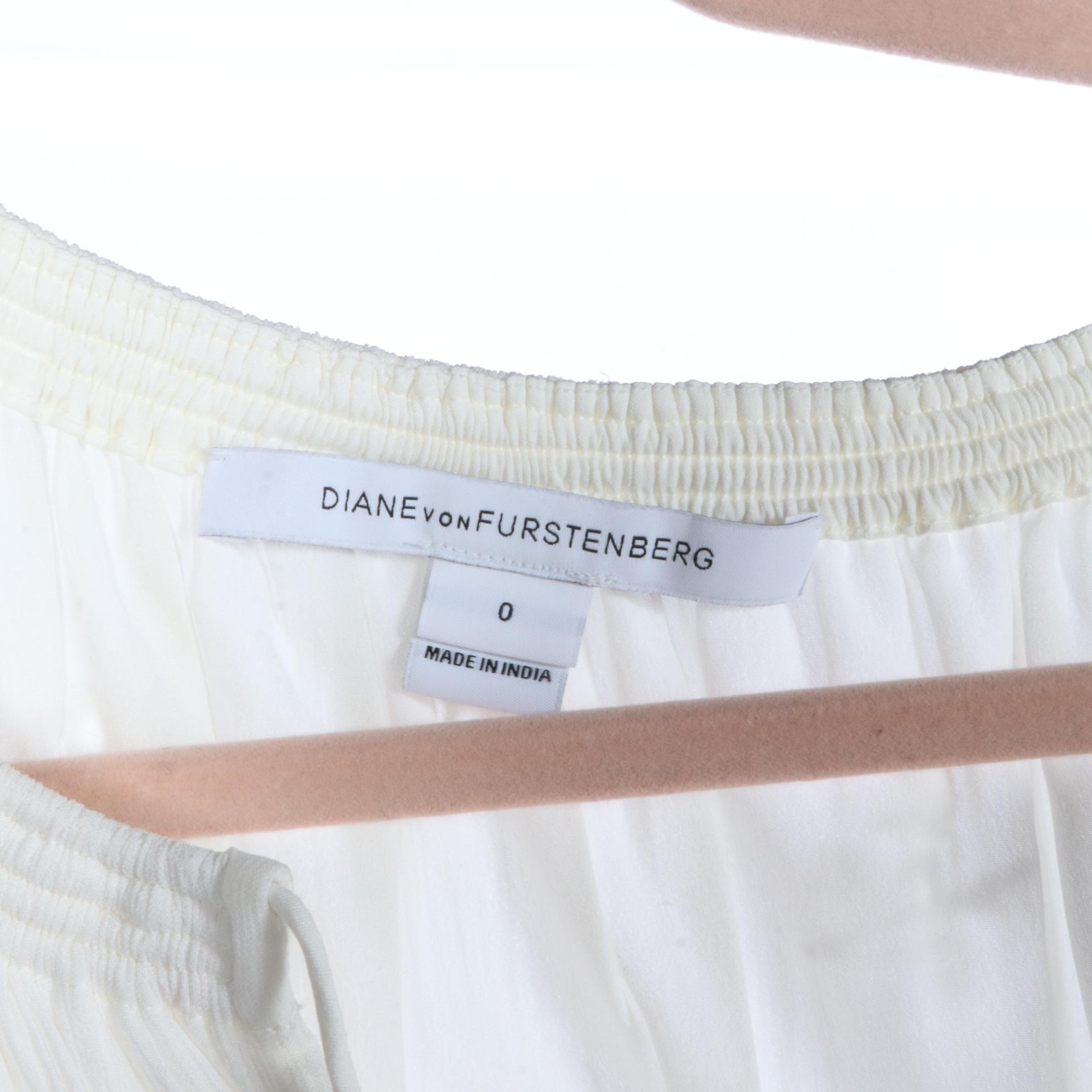 C/MEO Collective Limitless Cape and DVF Diane von Furstenberg Eyelet Dress