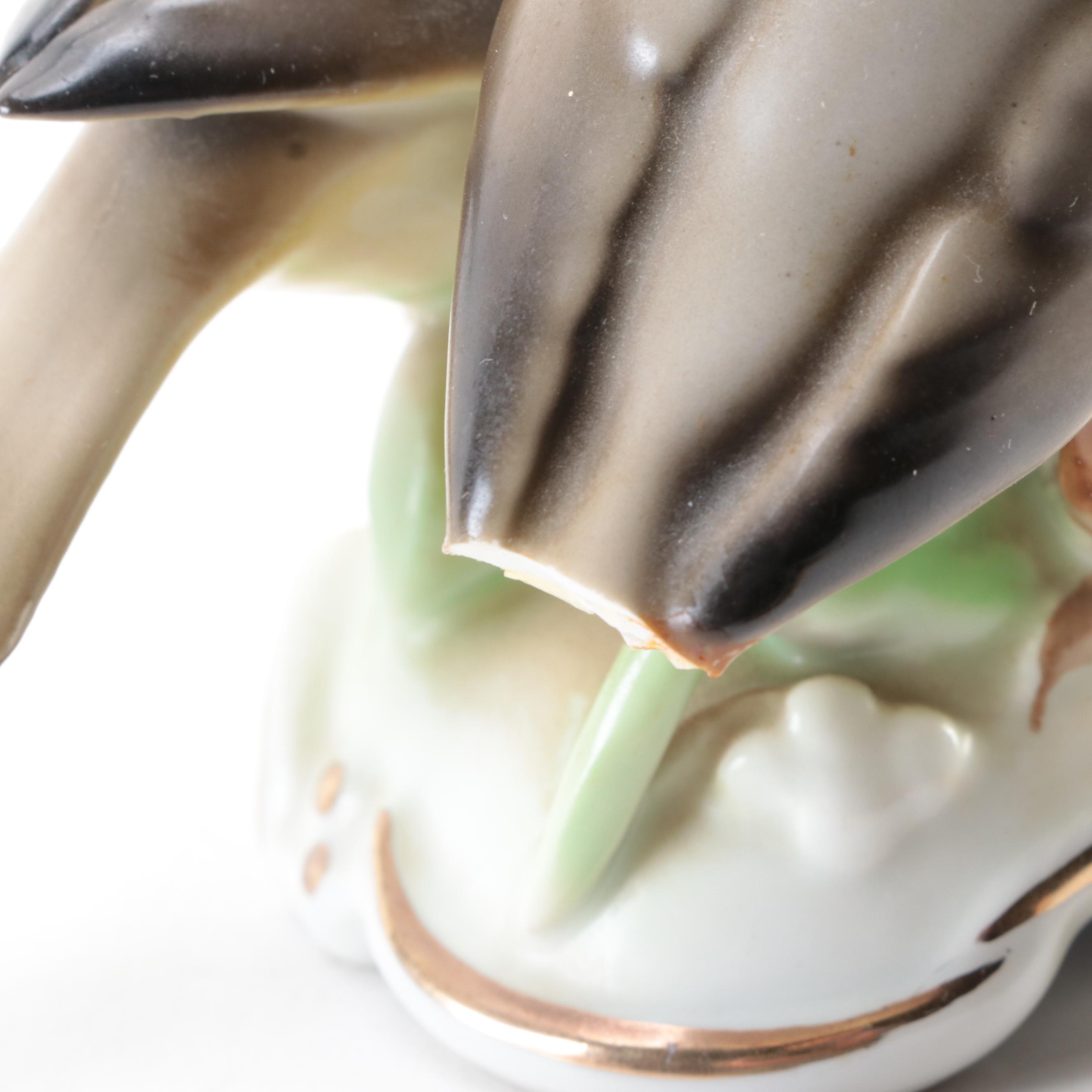 Cast Iron Horseshoe Bookends with Trout and Reel Bookend and Porcelain Figurine