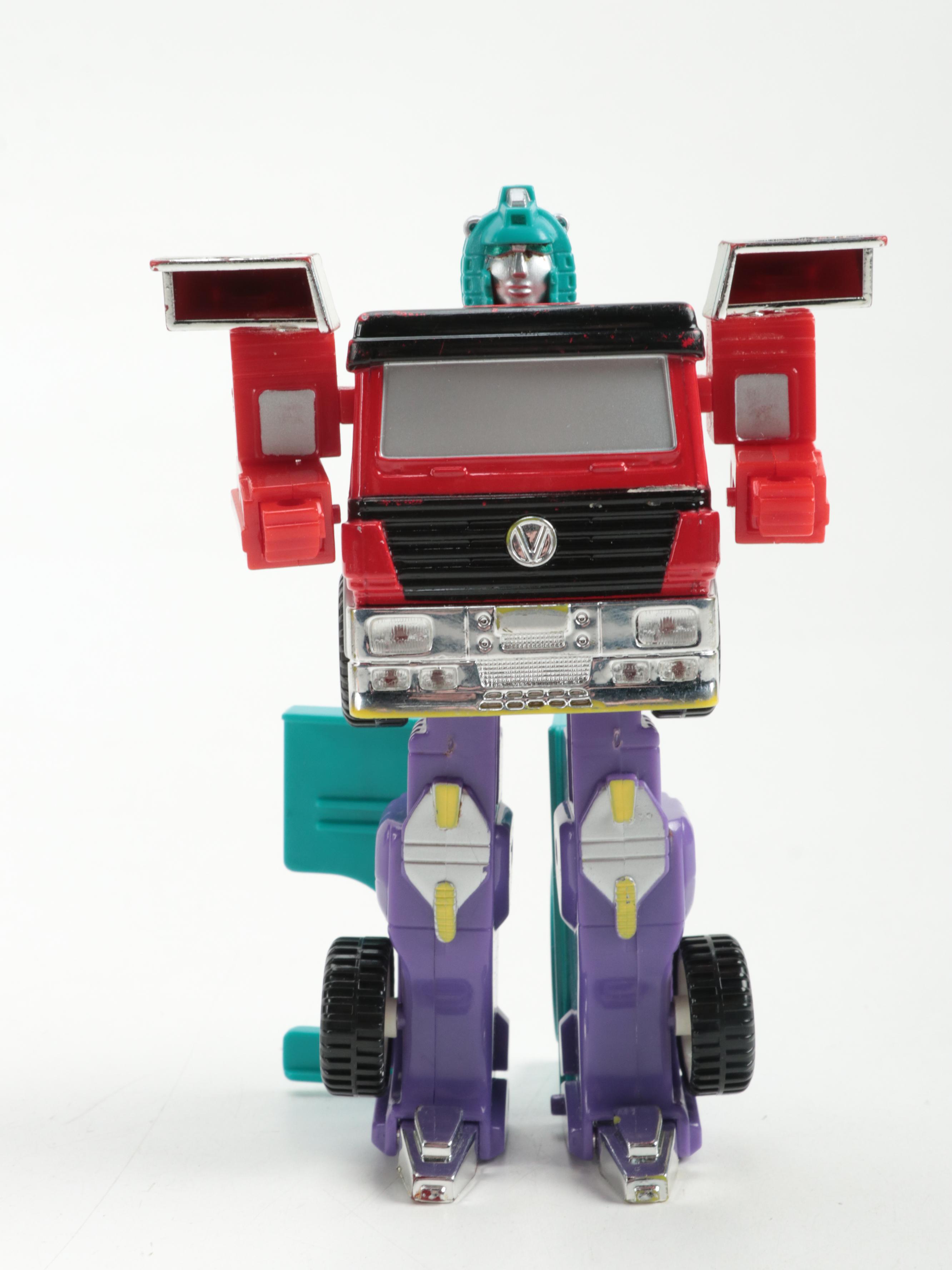 Transformer Action Figure with Other Cars and Race Track