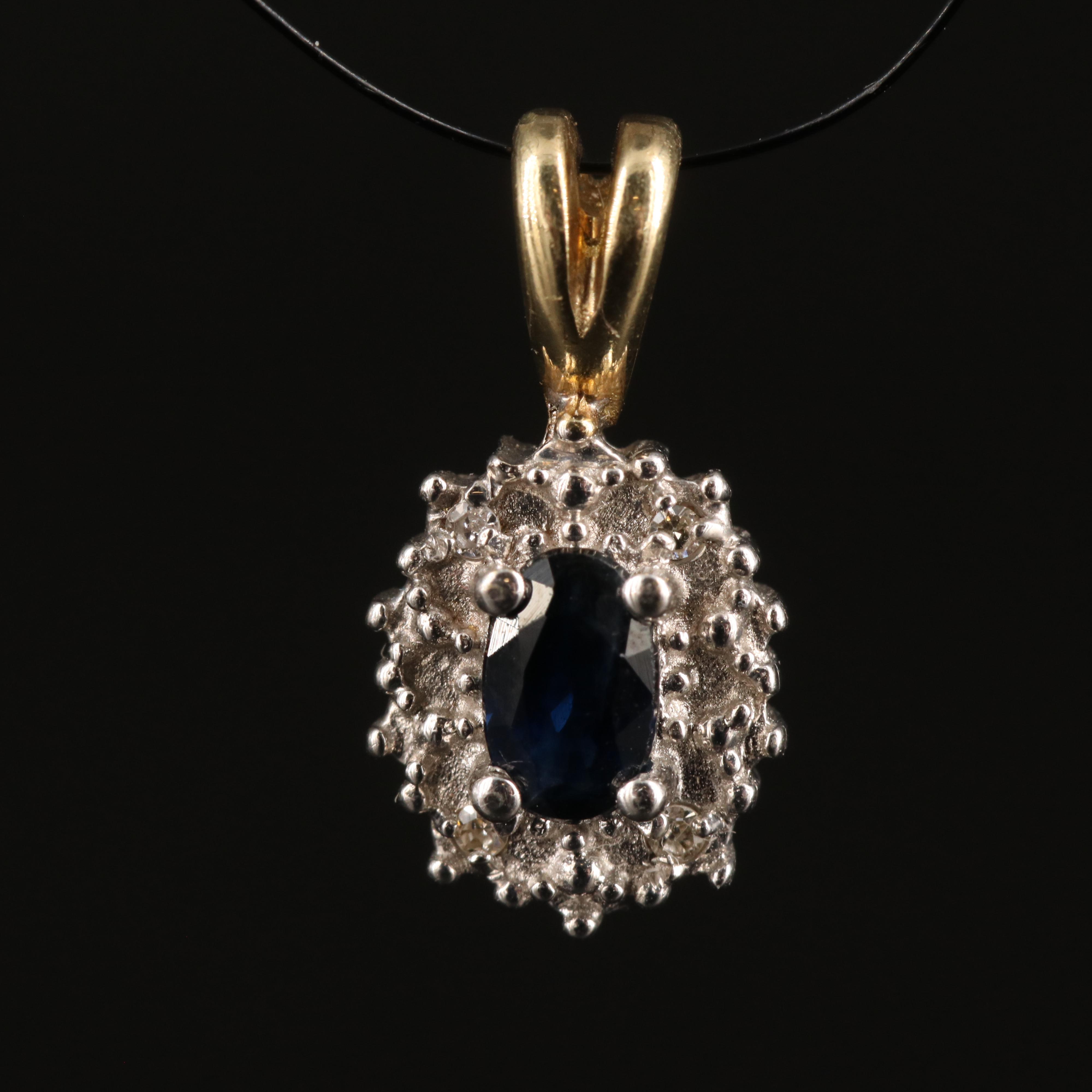 10K Sapphire and 0.02 CTW Diamond Halo Pendant