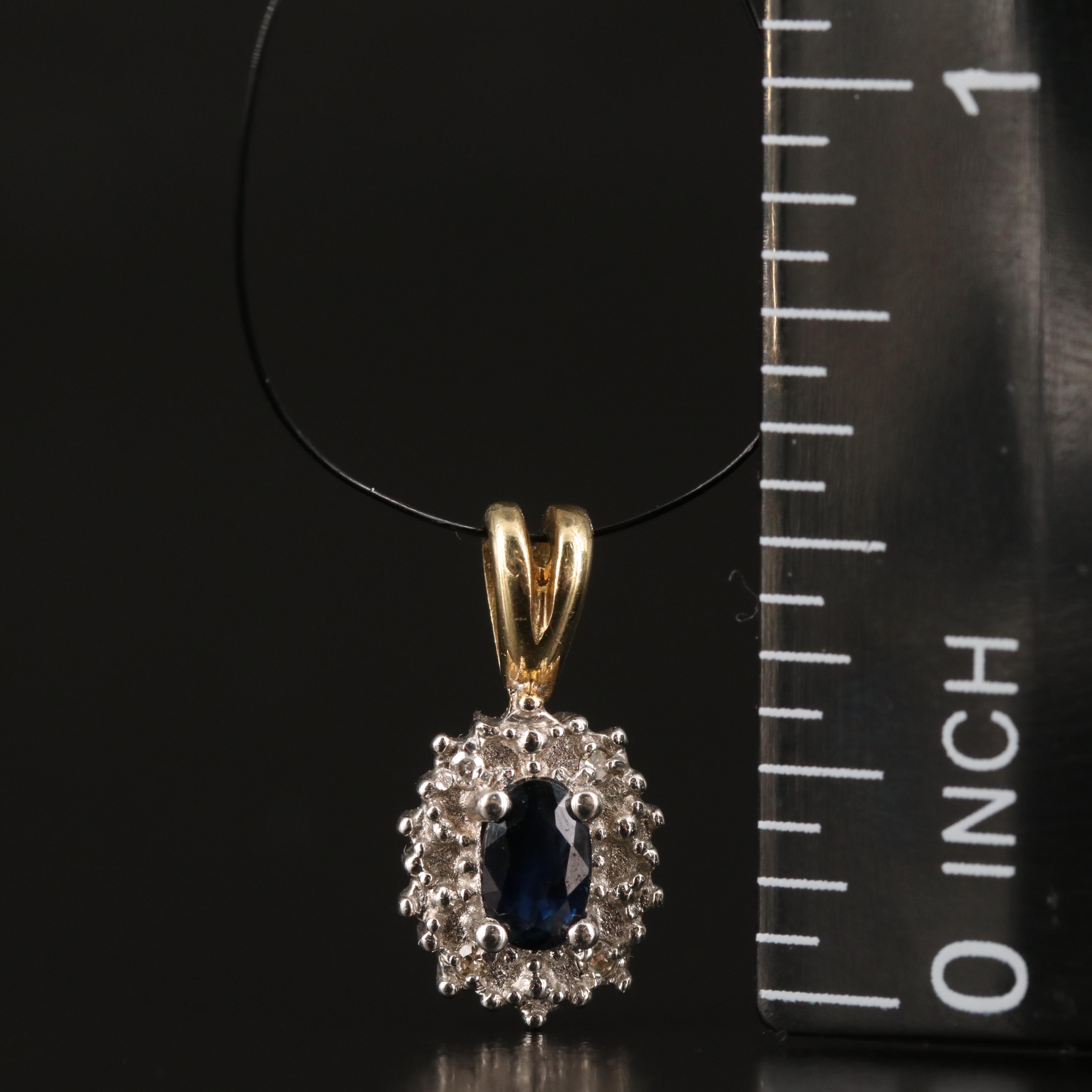 10K Sapphire and 0.02 CTW Diamond Halo Pendant