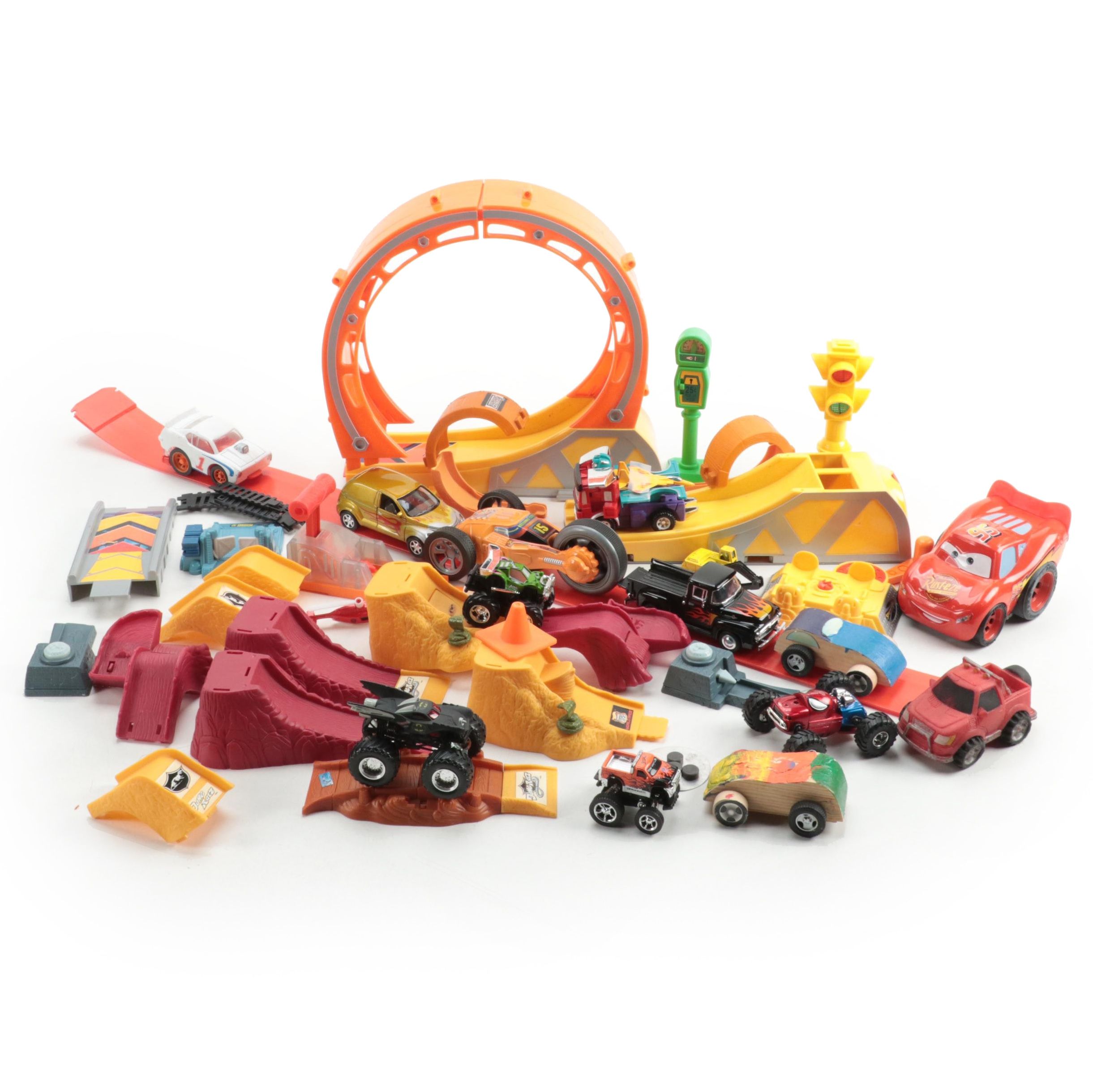 Transformer Action Figure with Other Cars and Race Track