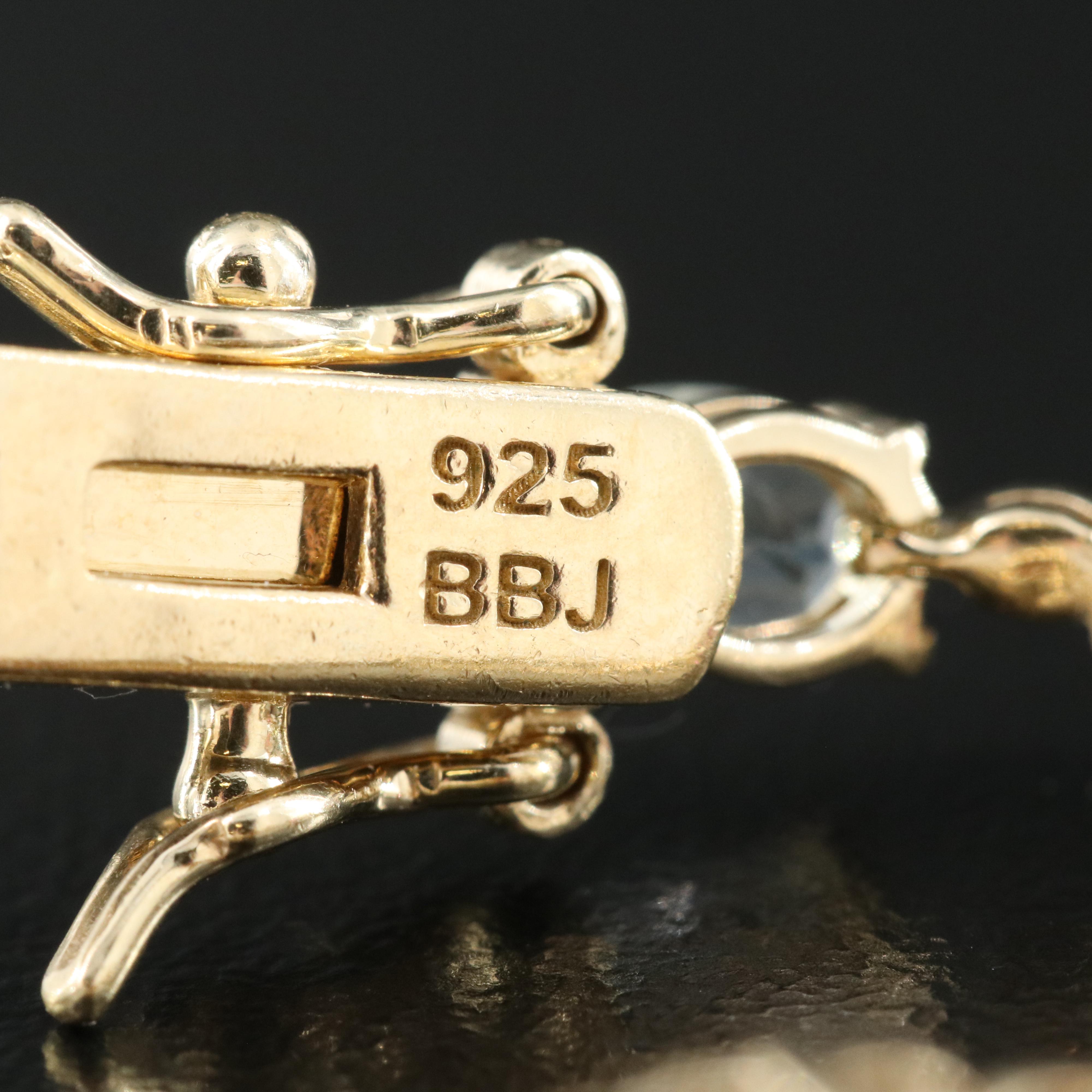 Sterling Bracelet Including Amethyst, Garnet and Diamond