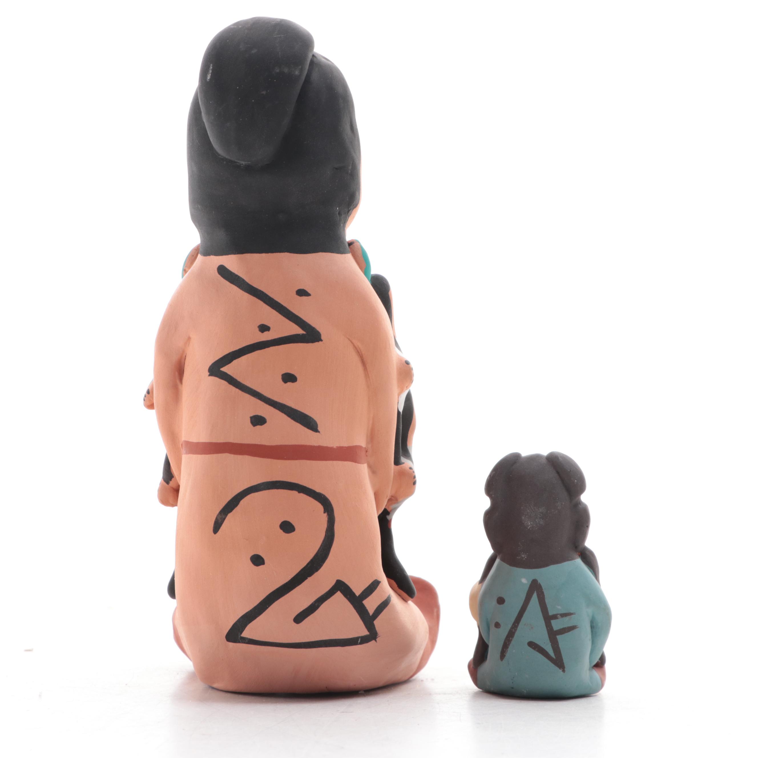 Artist Signed Ceramic Storyteller Figurines