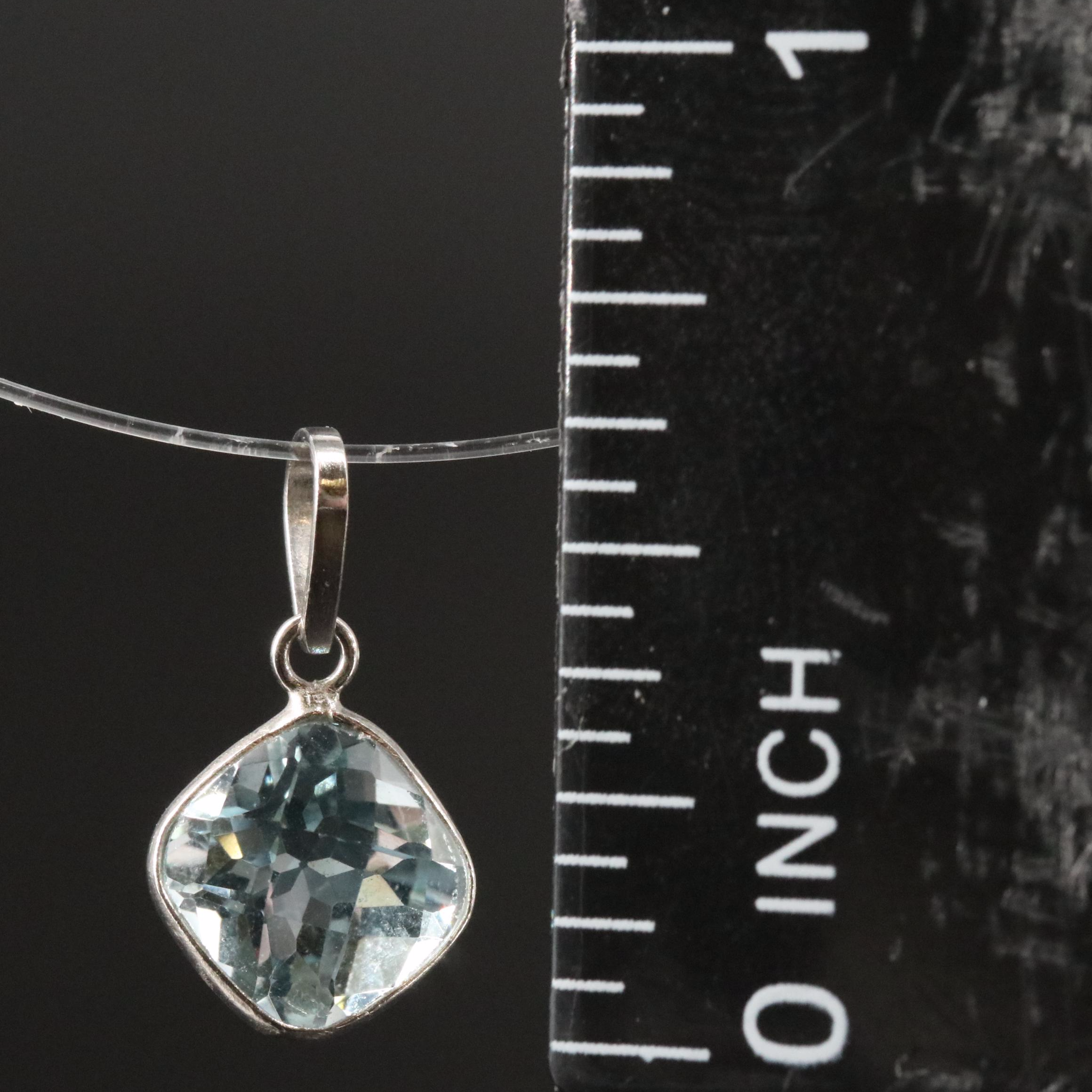 14K Blue Topaz Pendant