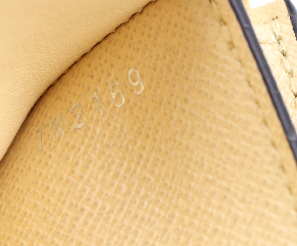 Louis Vuitton Zoe Wallet in Monogram LV Pop Canvas