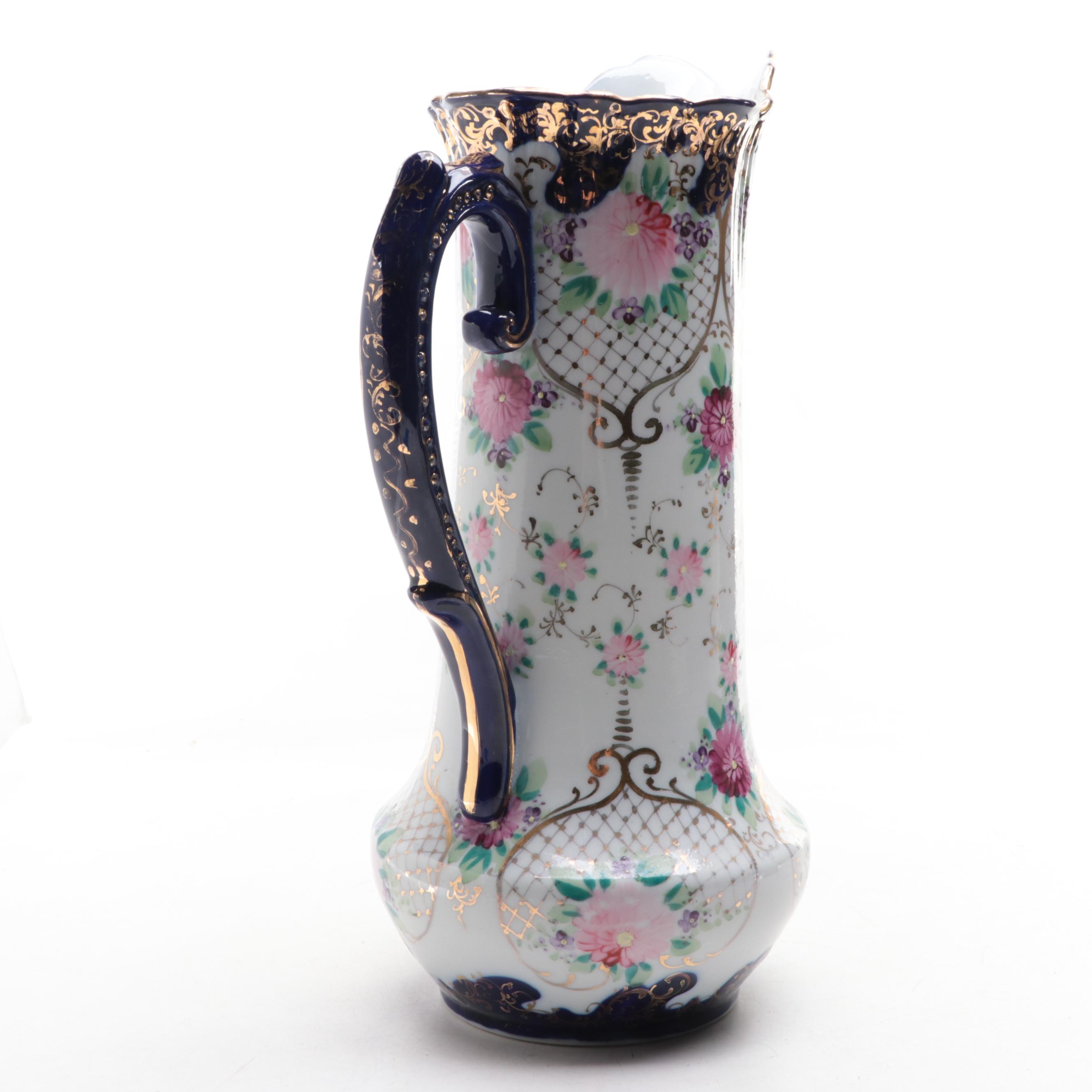 Rococo Style Gilt Accented Hand-Painted Porcelain Pitcher, Early 20th Century