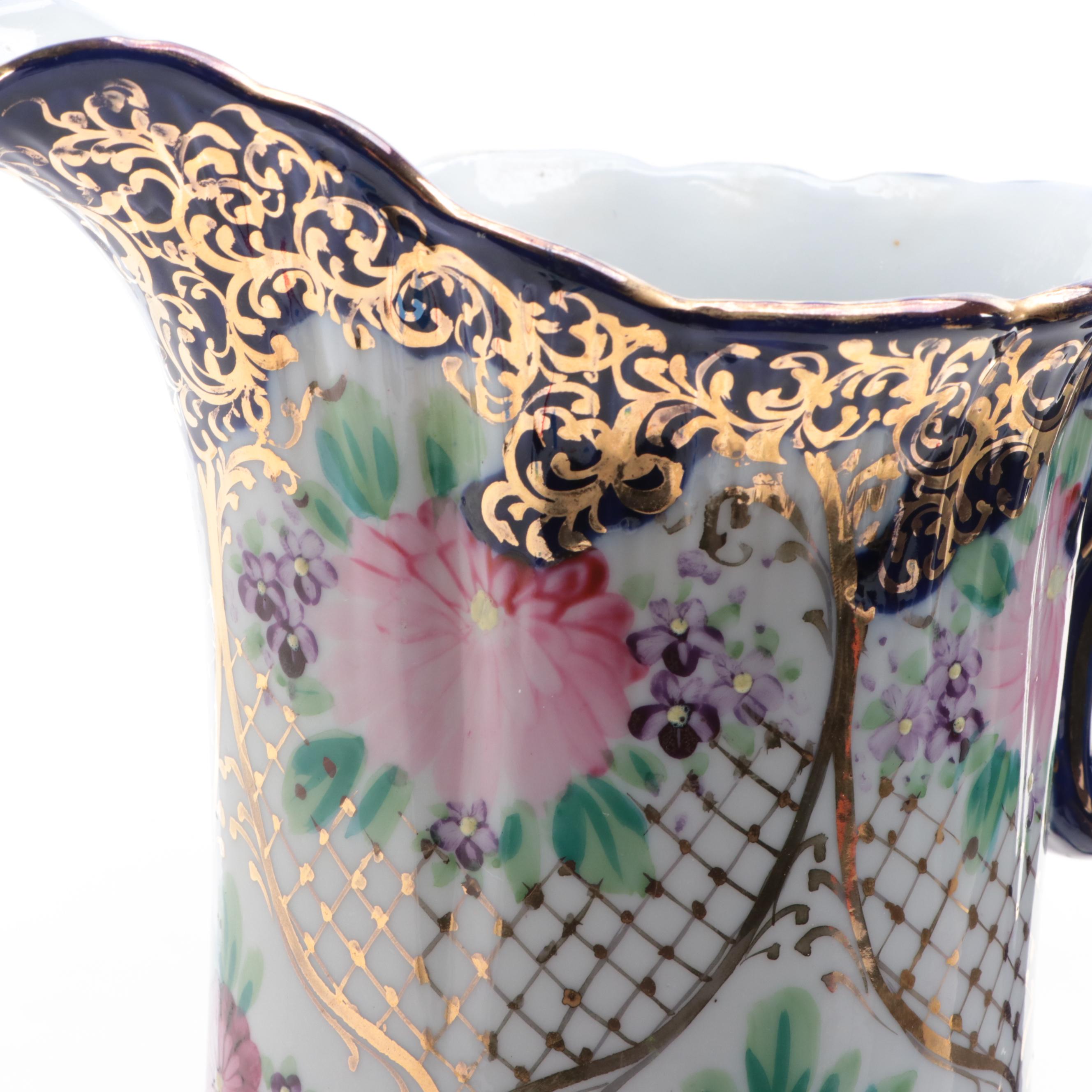 Rococo Style Gilt Accented Hand-Painted Porcelain Pitcher, Early 20th Century