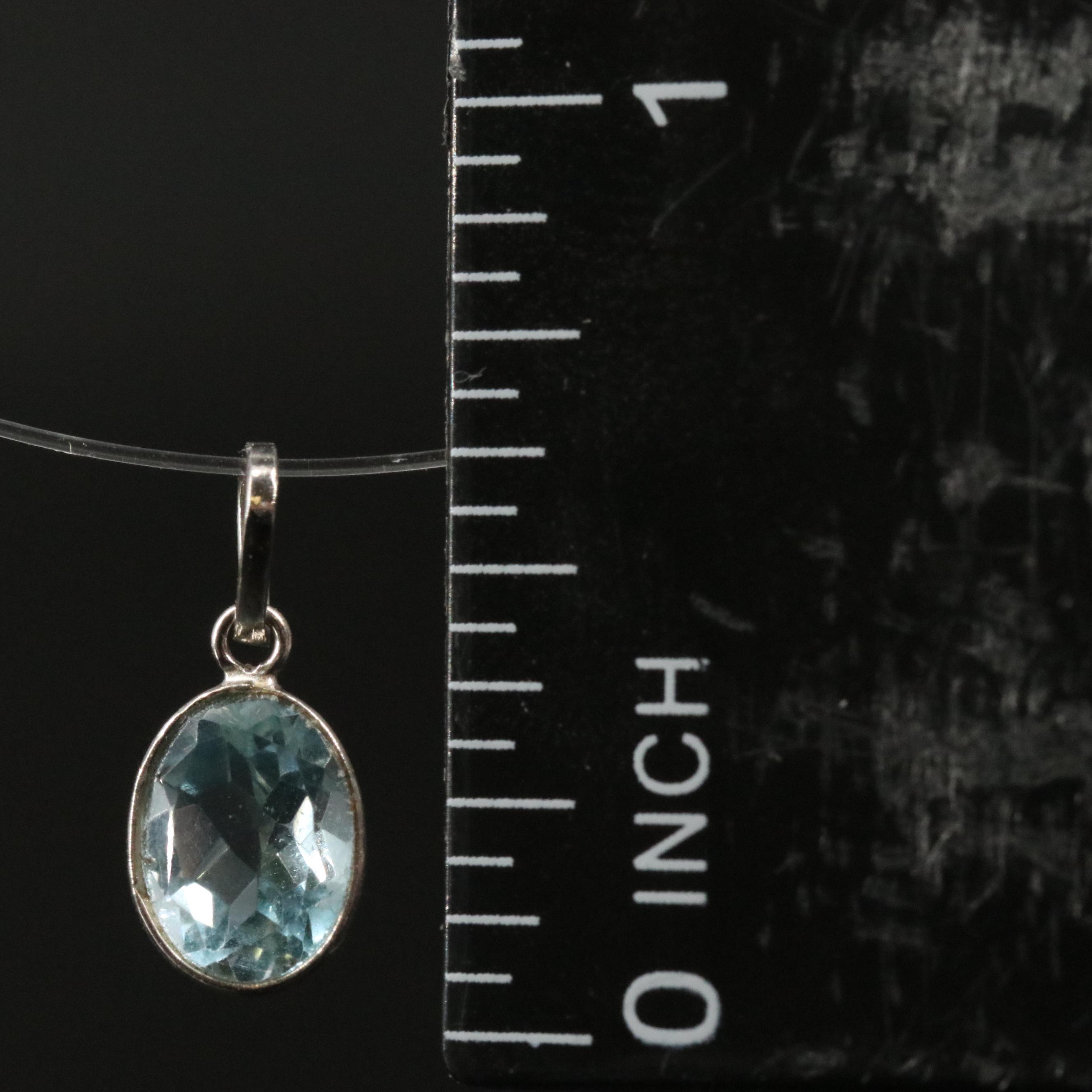 14K Blue Topaz Pendant