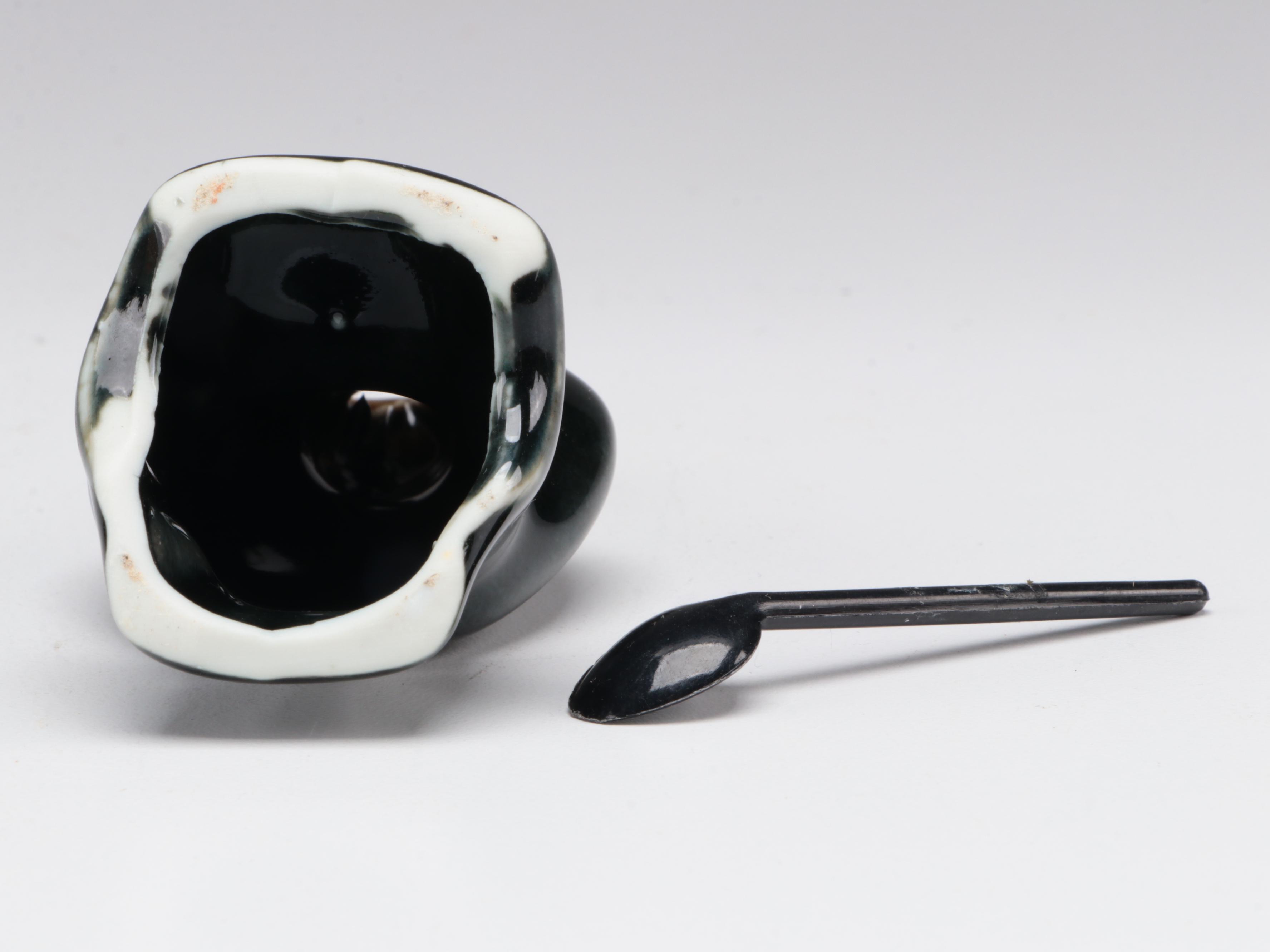 Uranium Glass and Other Measuring Cups with Egg Scale and Other Household Items