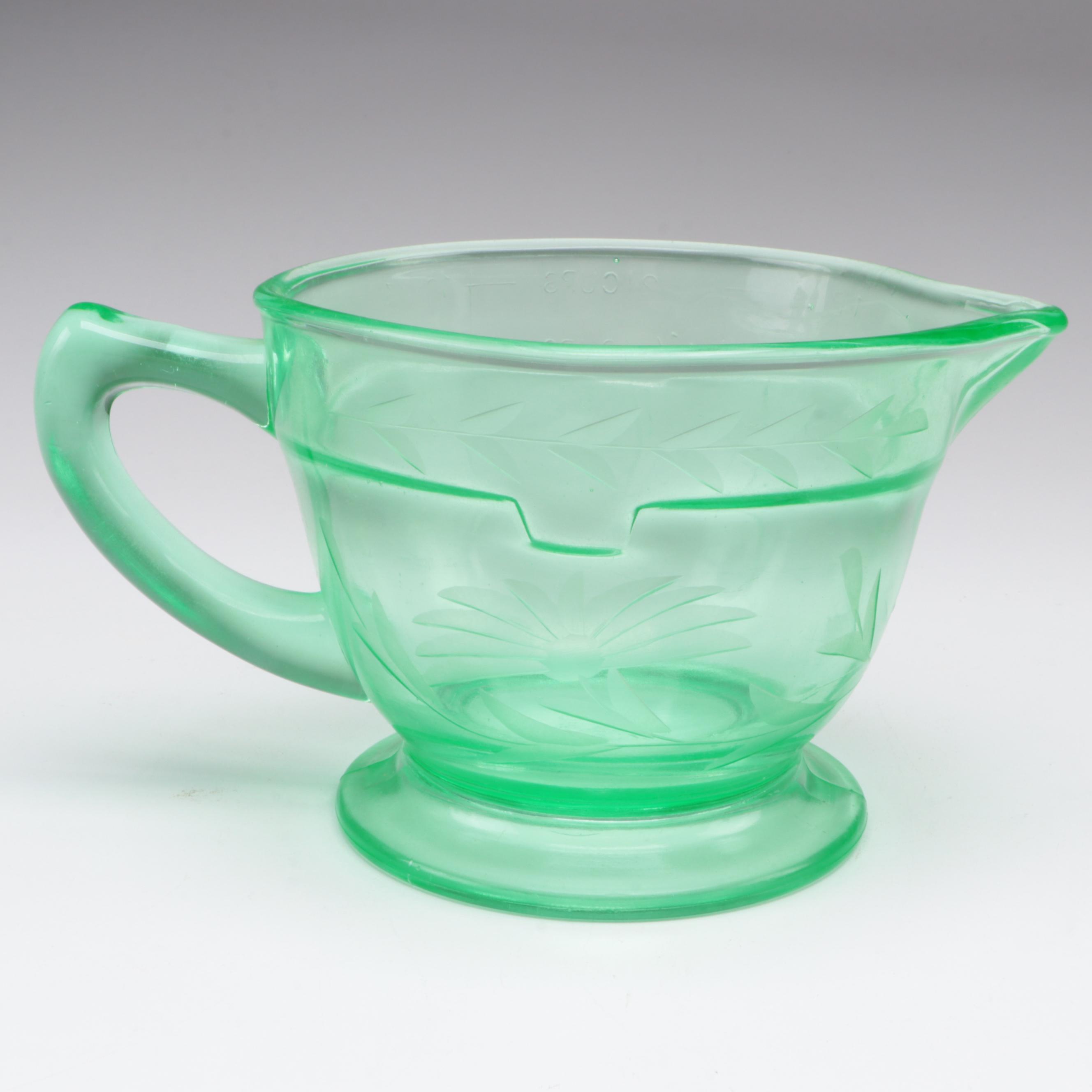 Uranium Glass and Other Measuring Cups with Egg Scale and Other Household Items
