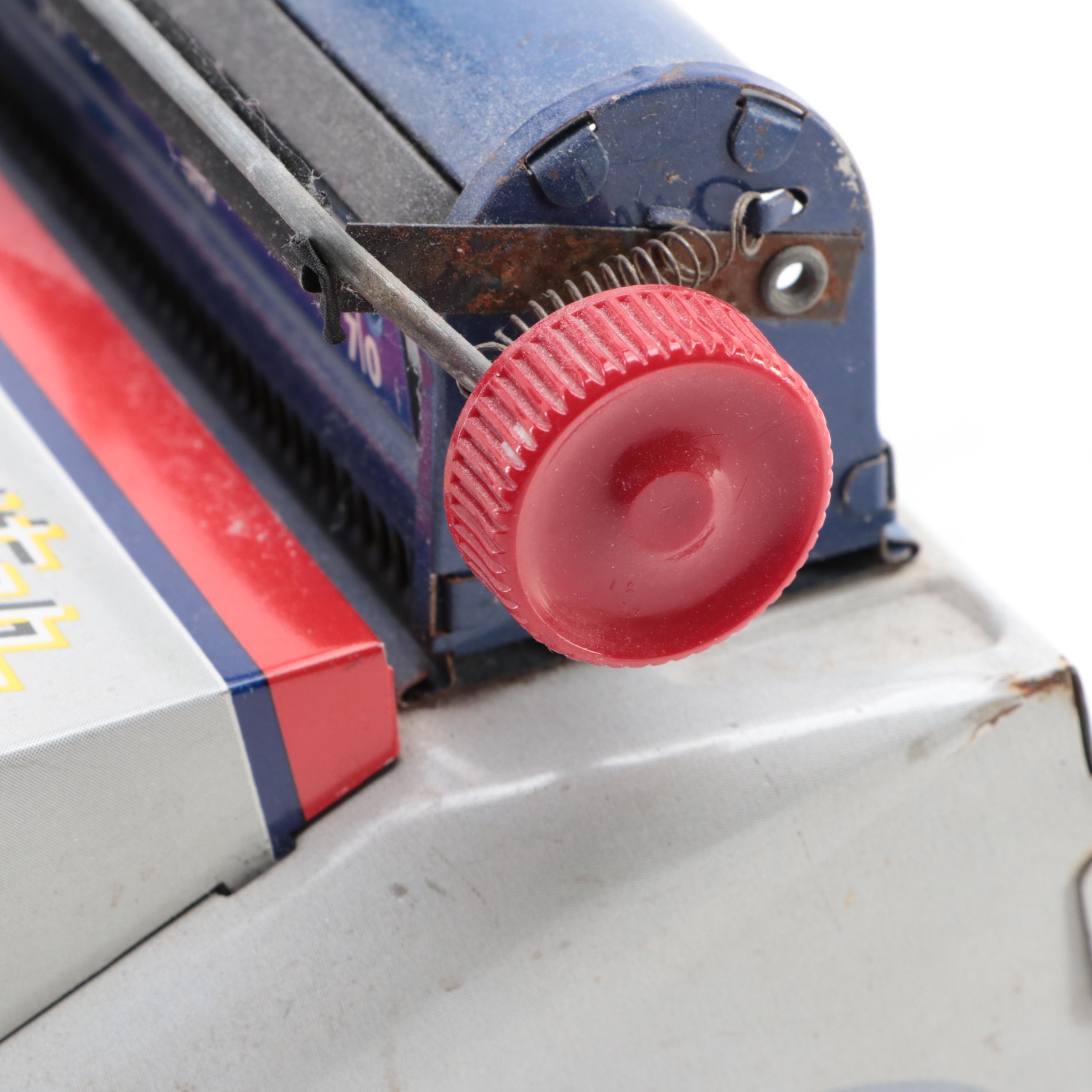 Marx Tin Lithograph “Junior" Dial Typewriter, Mid-20th Century