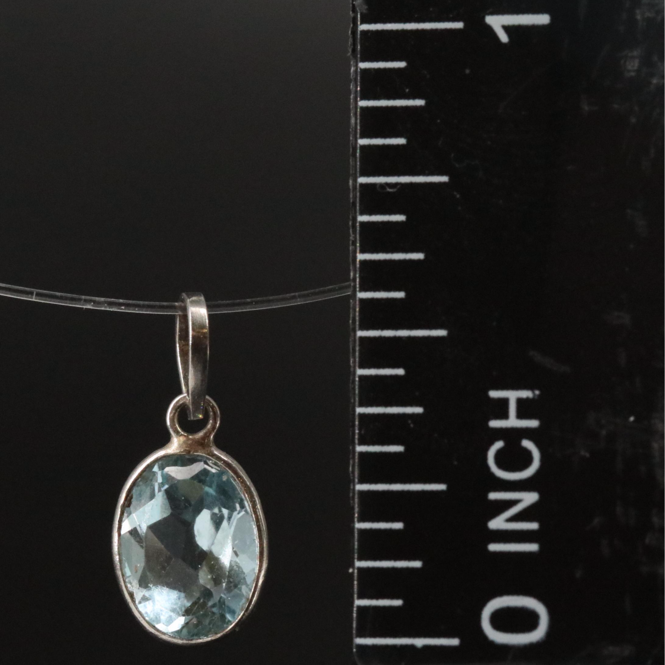 14K Blue Topaz Pendant