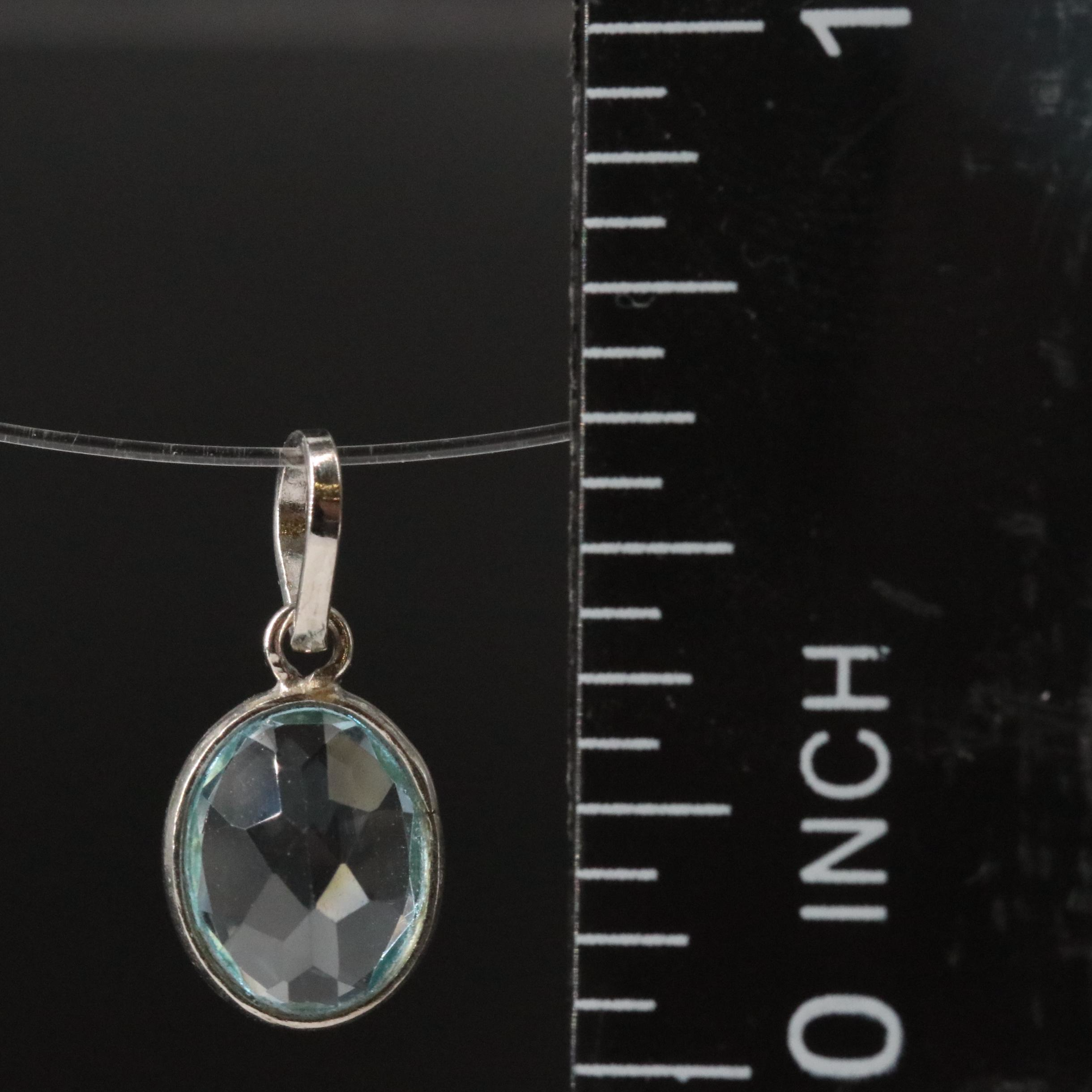 14K Blue Topaz Pendant