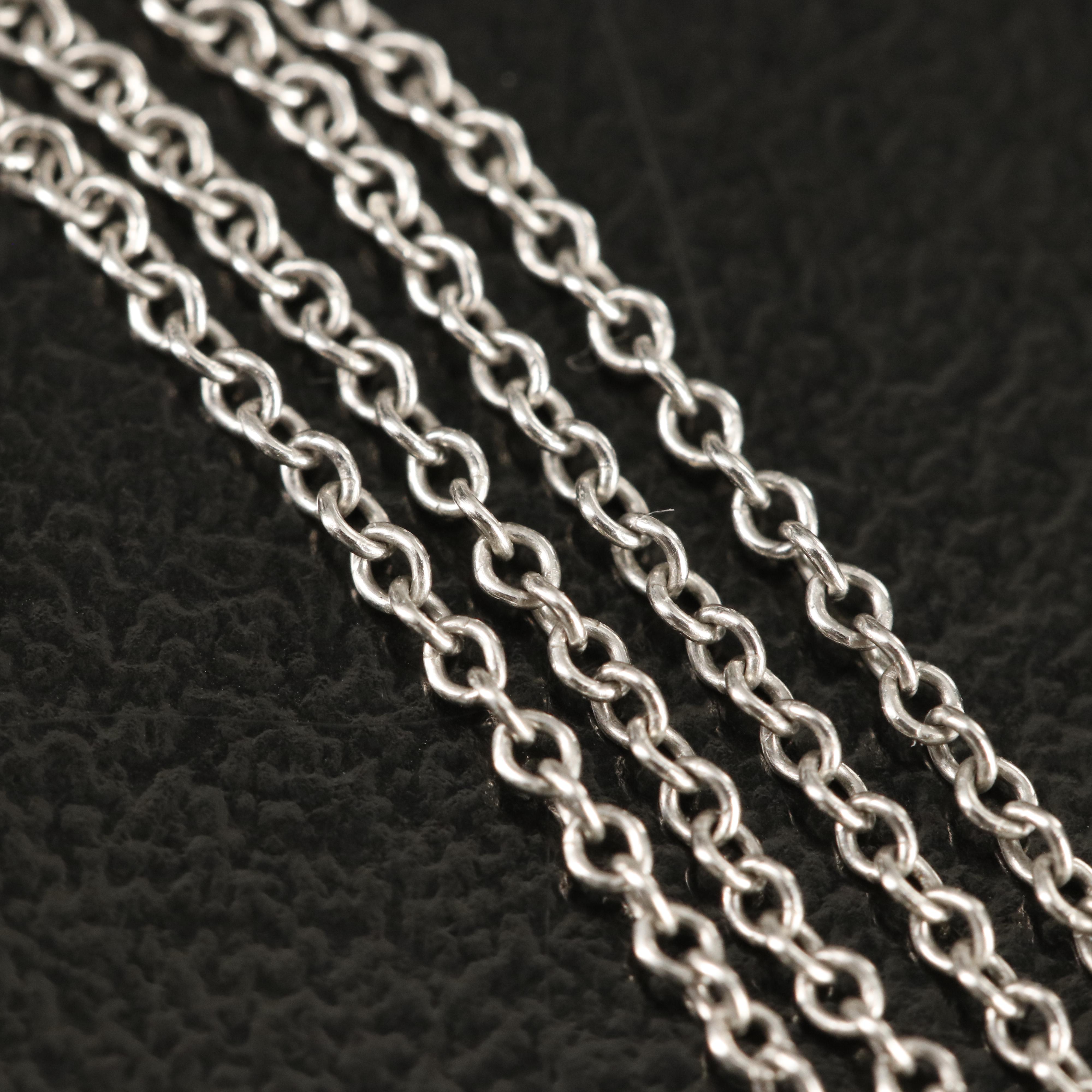 Tiffany & Co. "Tiffany Keys" Ruby and Diamond Victoria Key Pendant Necklace