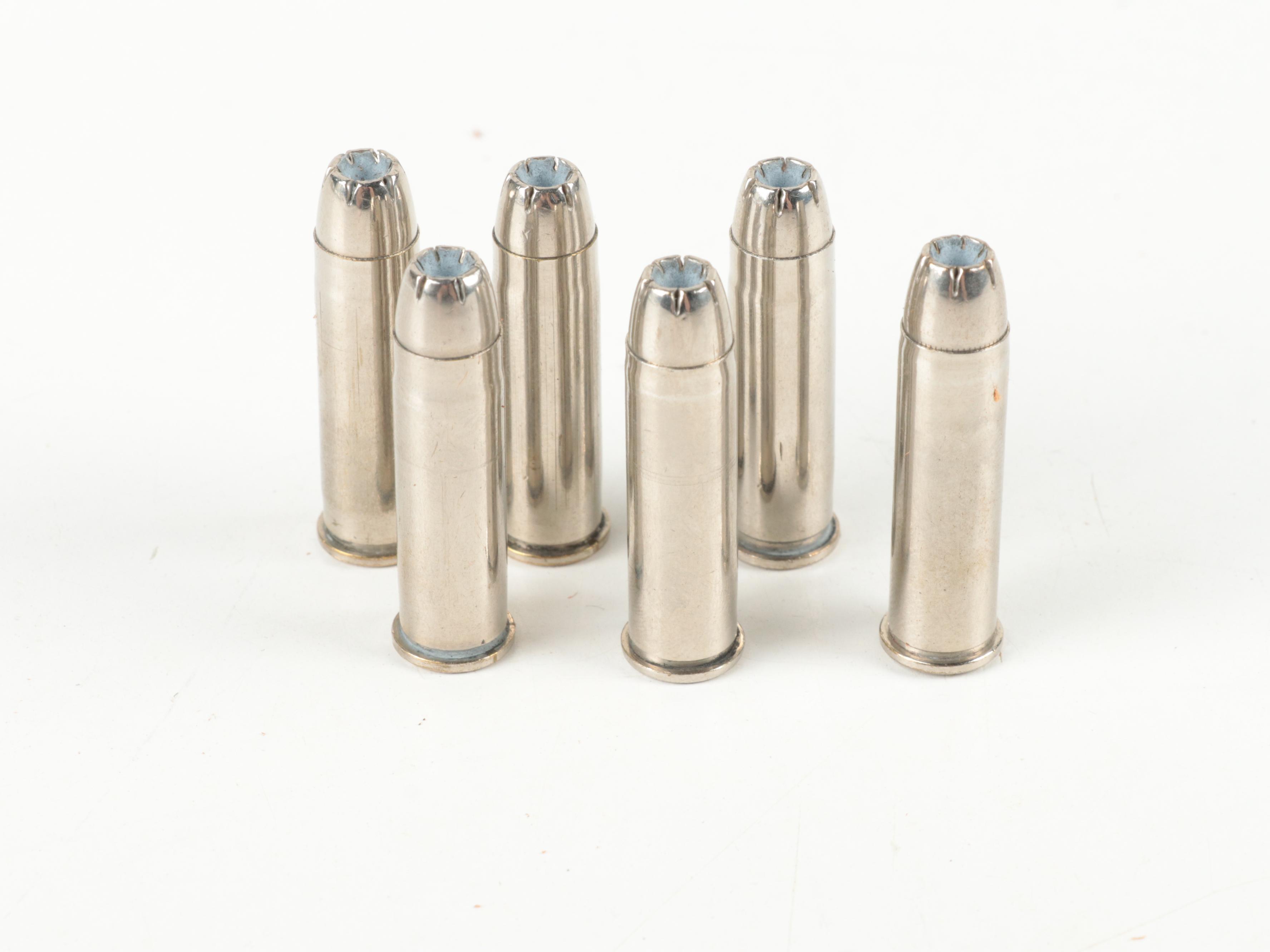 Colt Revolver Display Case with Ornamental Colt 45s With 357 Magnum Ammunition