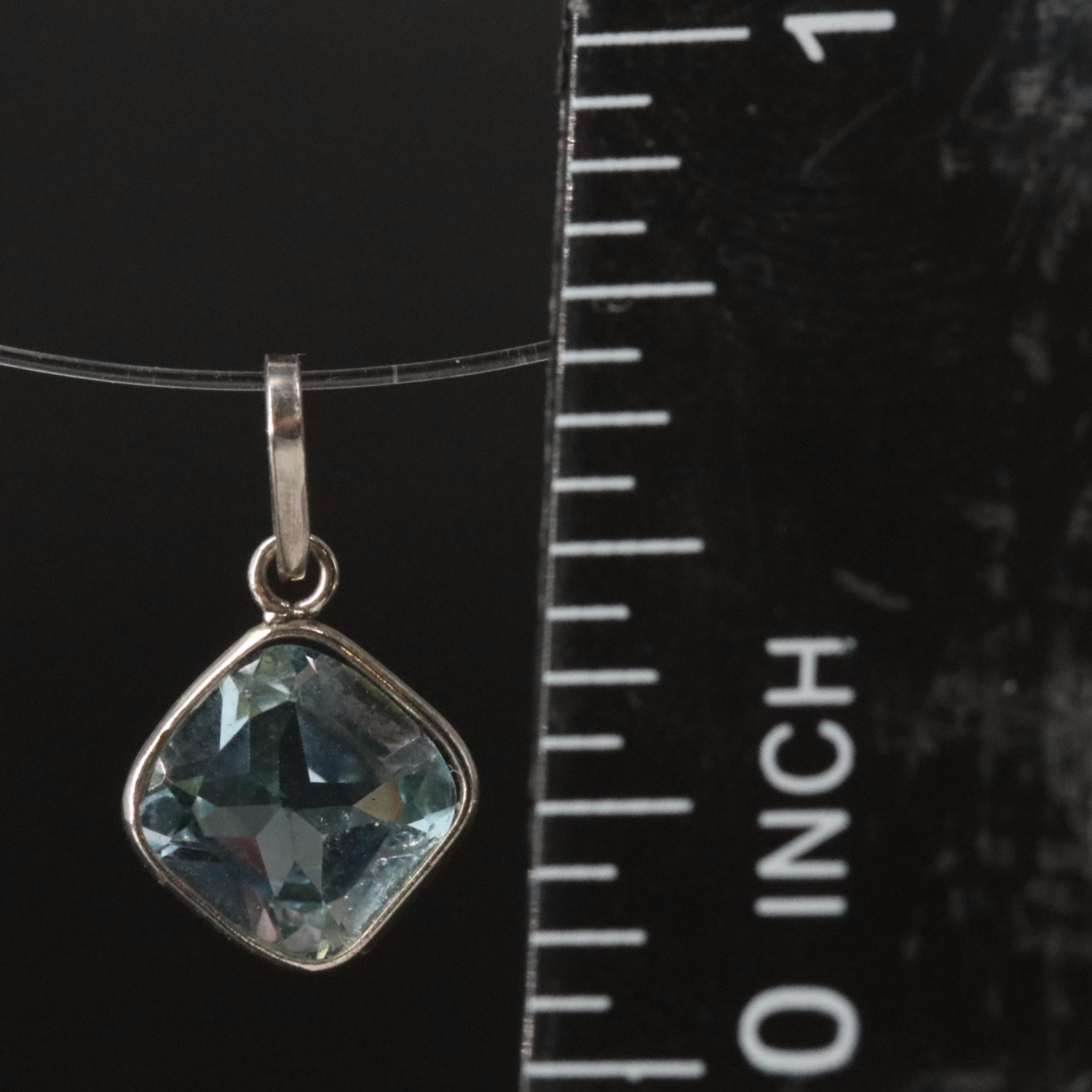 14K Blue Topaz Pendant