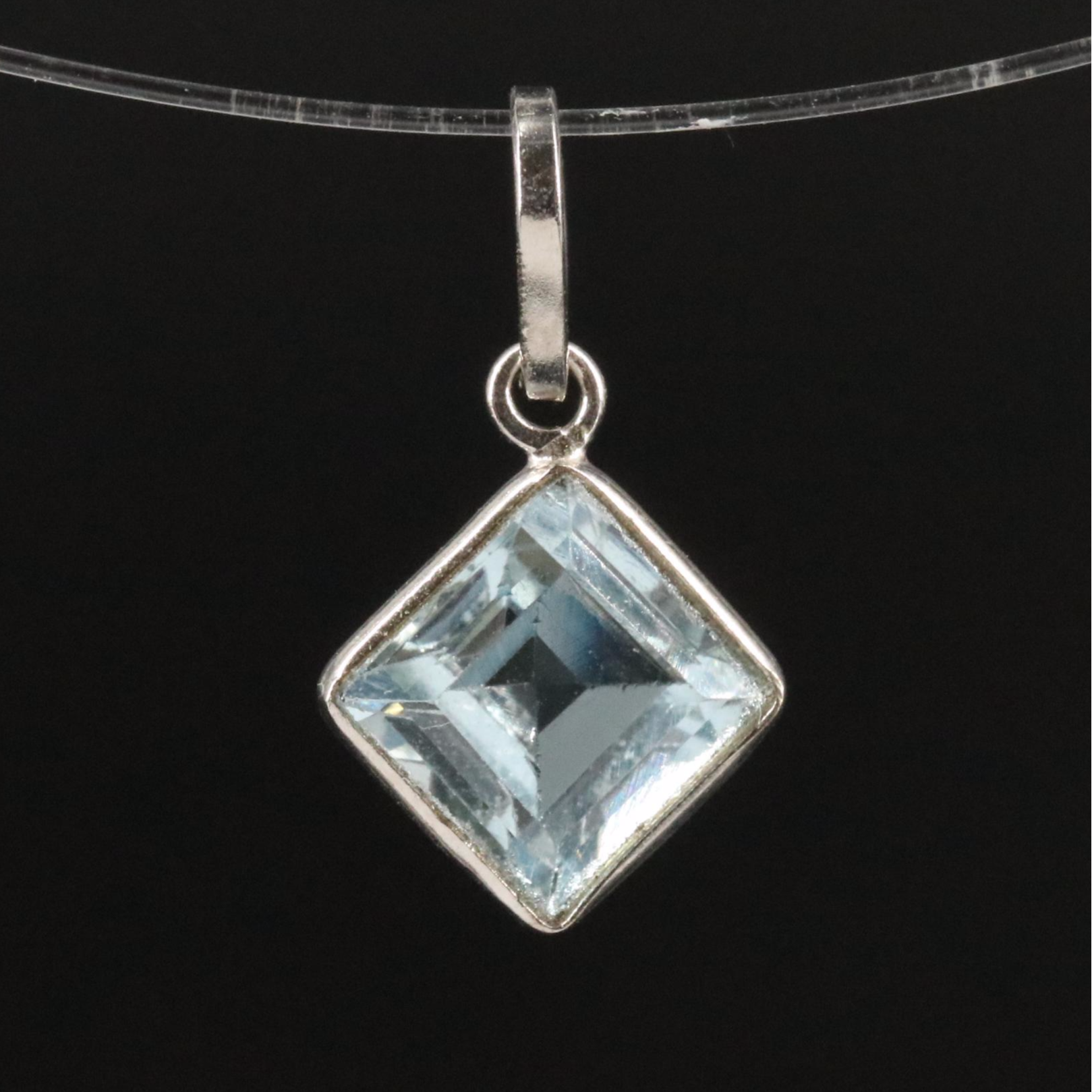 14K Blue Topaz Pendant