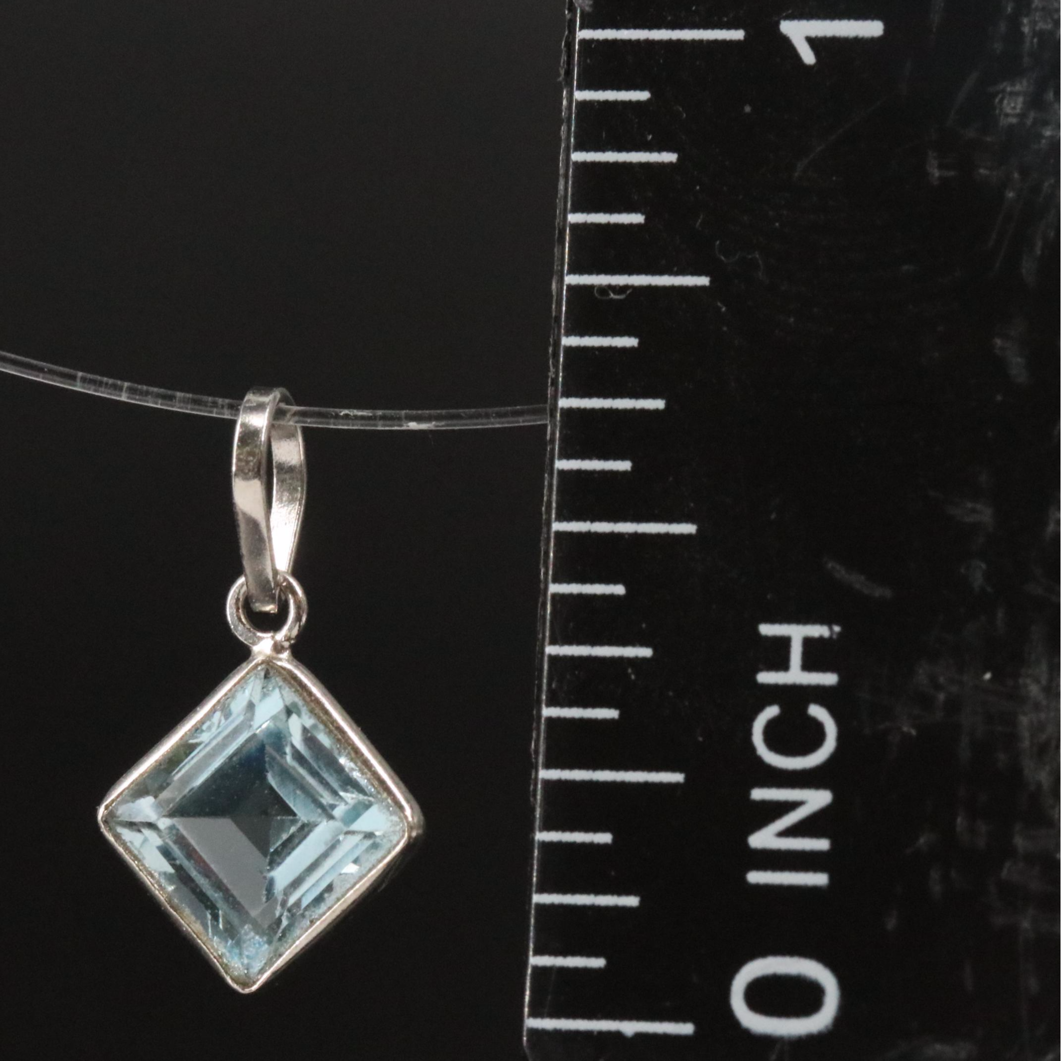 14K Blue Topaz Pendant