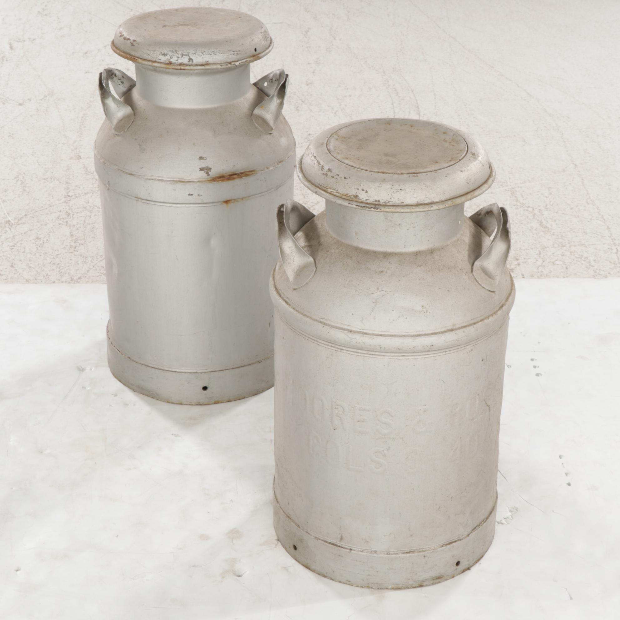 Two Galvanized Tin Milk Cans Featuring Moores & Ross Milk Co.