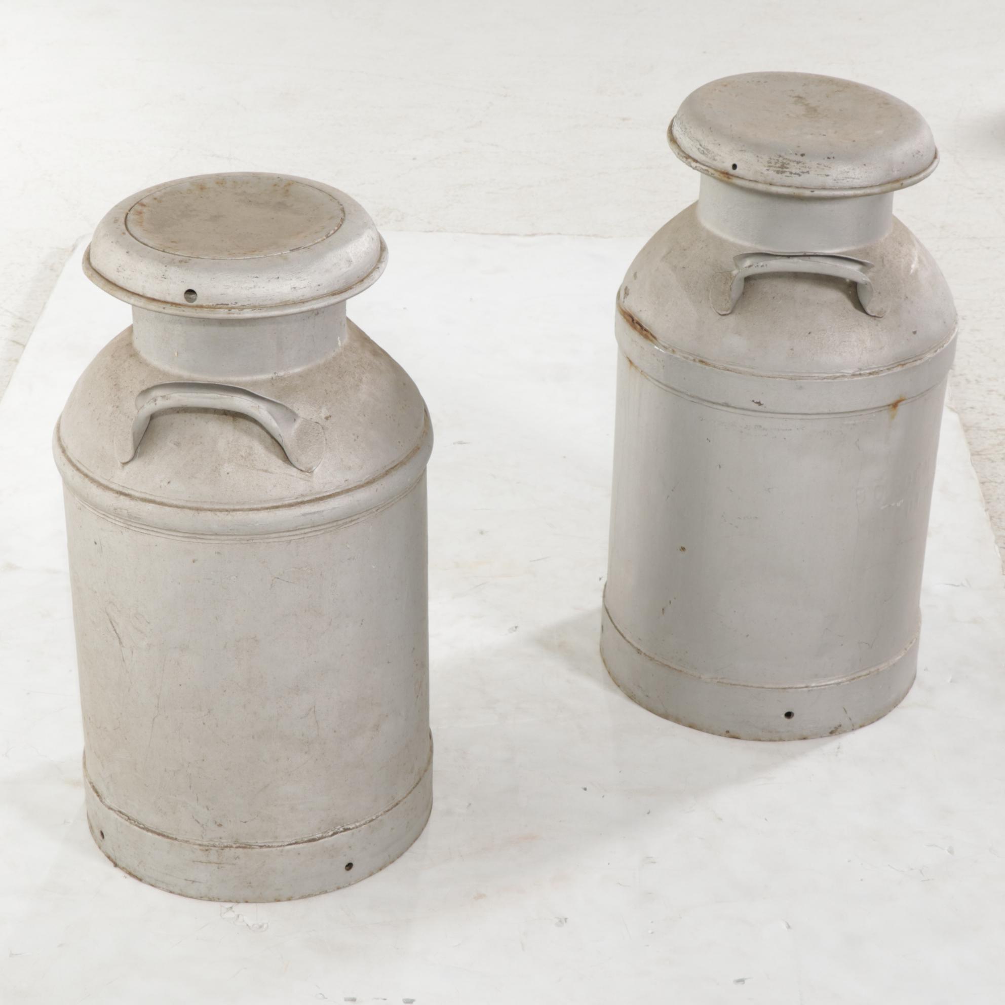 Two Galvanized Tin Milk Cans Featuring Moores & Ross Milk Co.