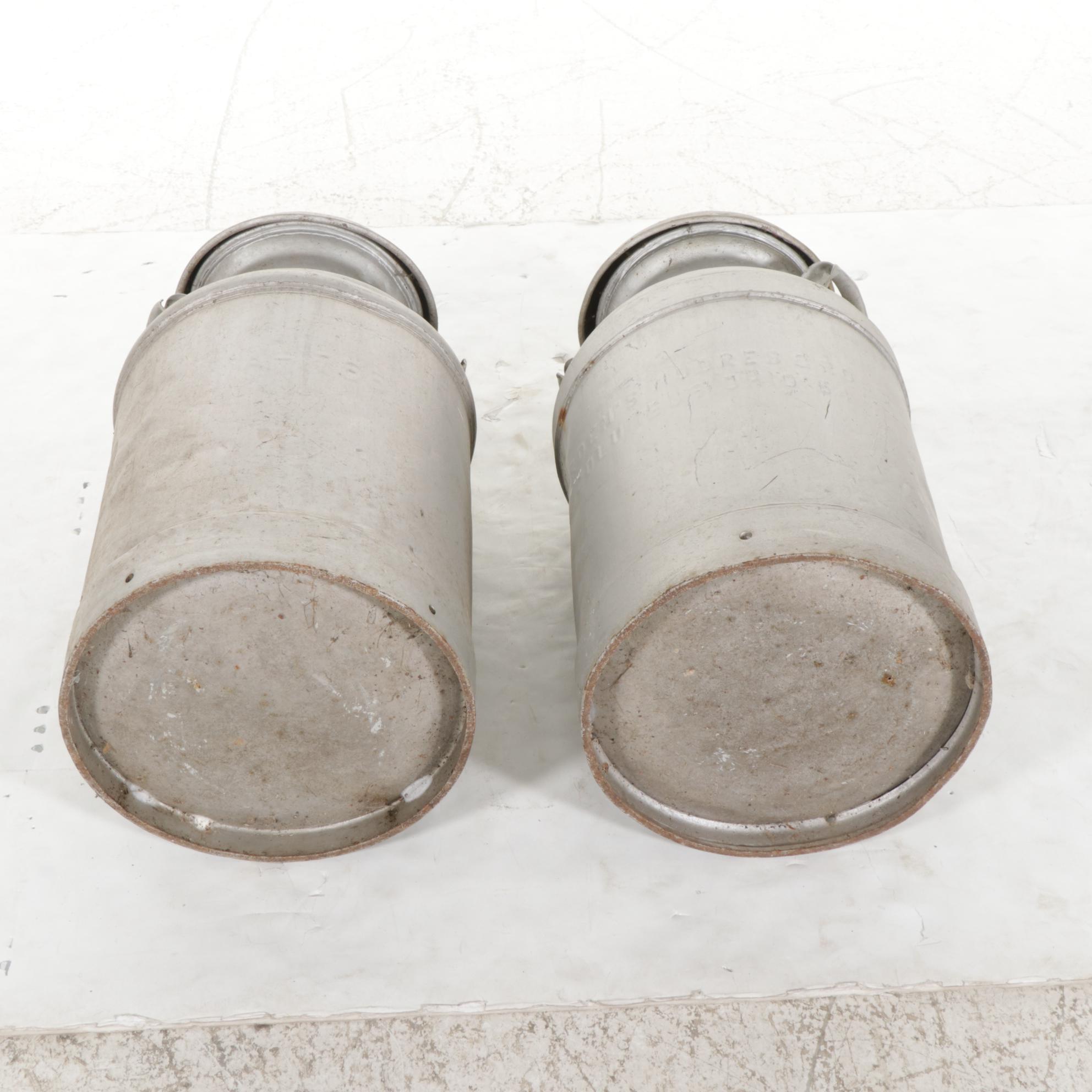 Two Galvanized Tin Milk Cans Featuring Moores & Ross Milk Co.