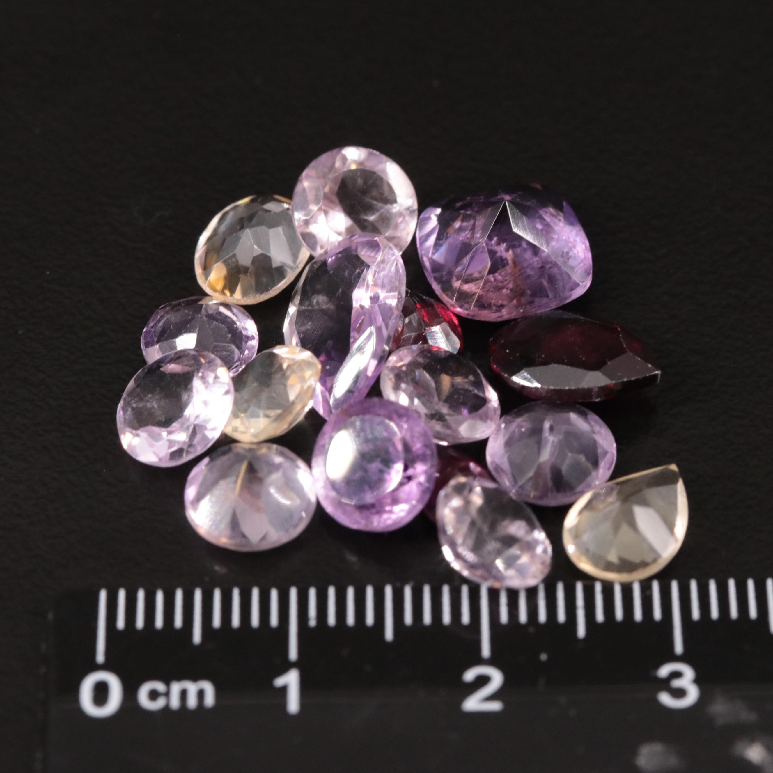 Loose 19.67 CTW Amethyst, Citrine and Garnet Lot
