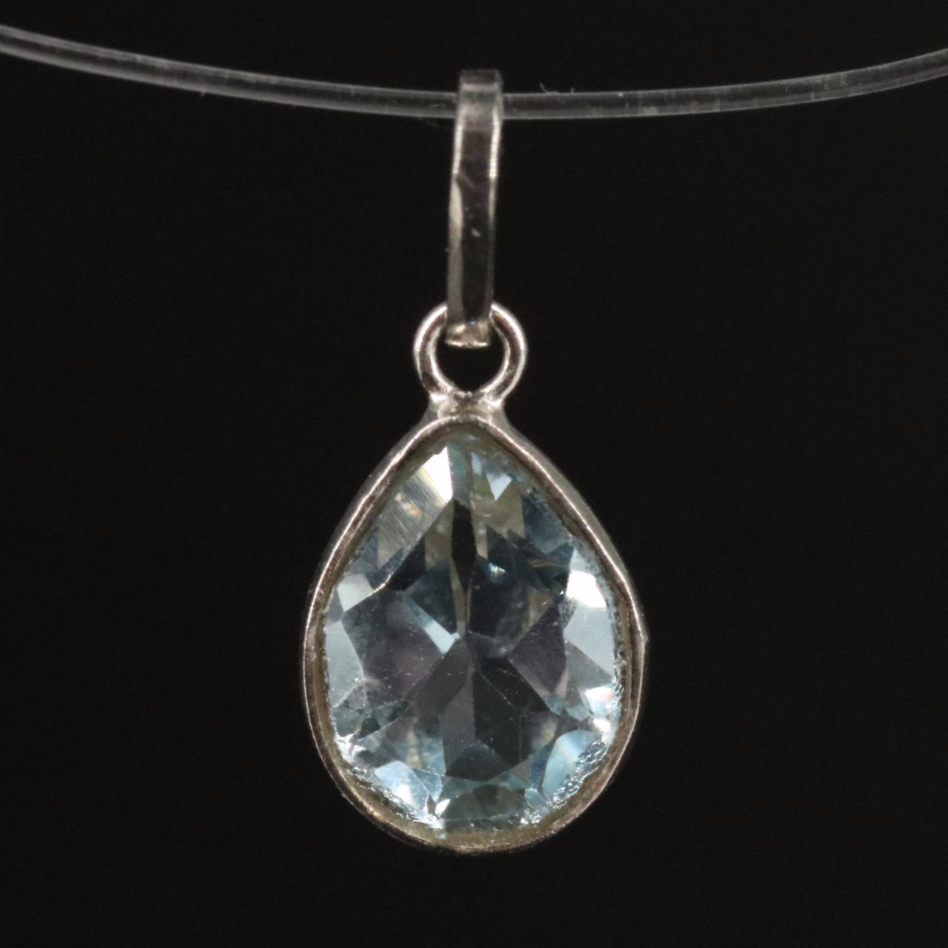 14K Blue Topaz Pendant