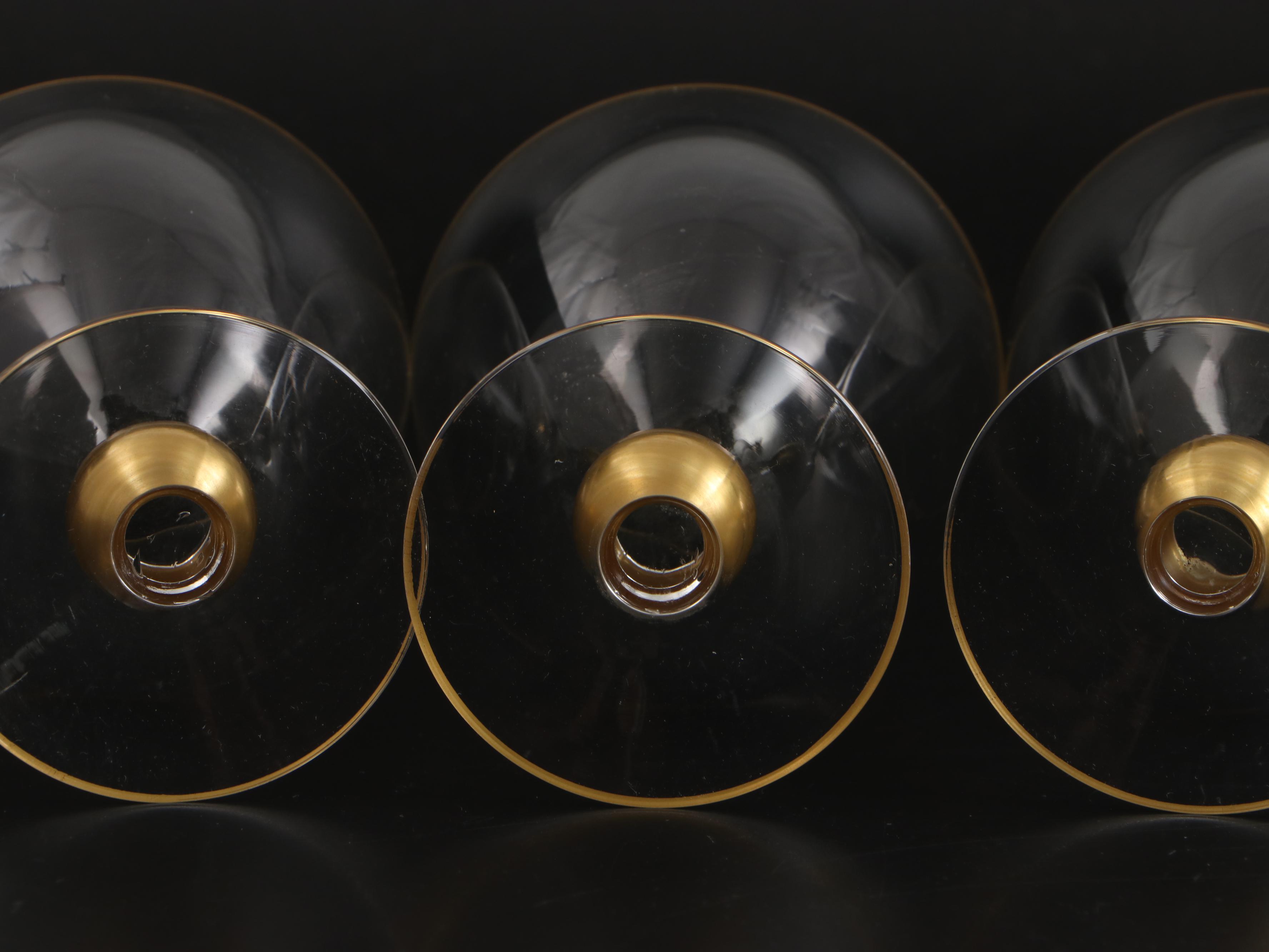 Gold Rimmed Glass Plates with Wine and Champagne Glasses