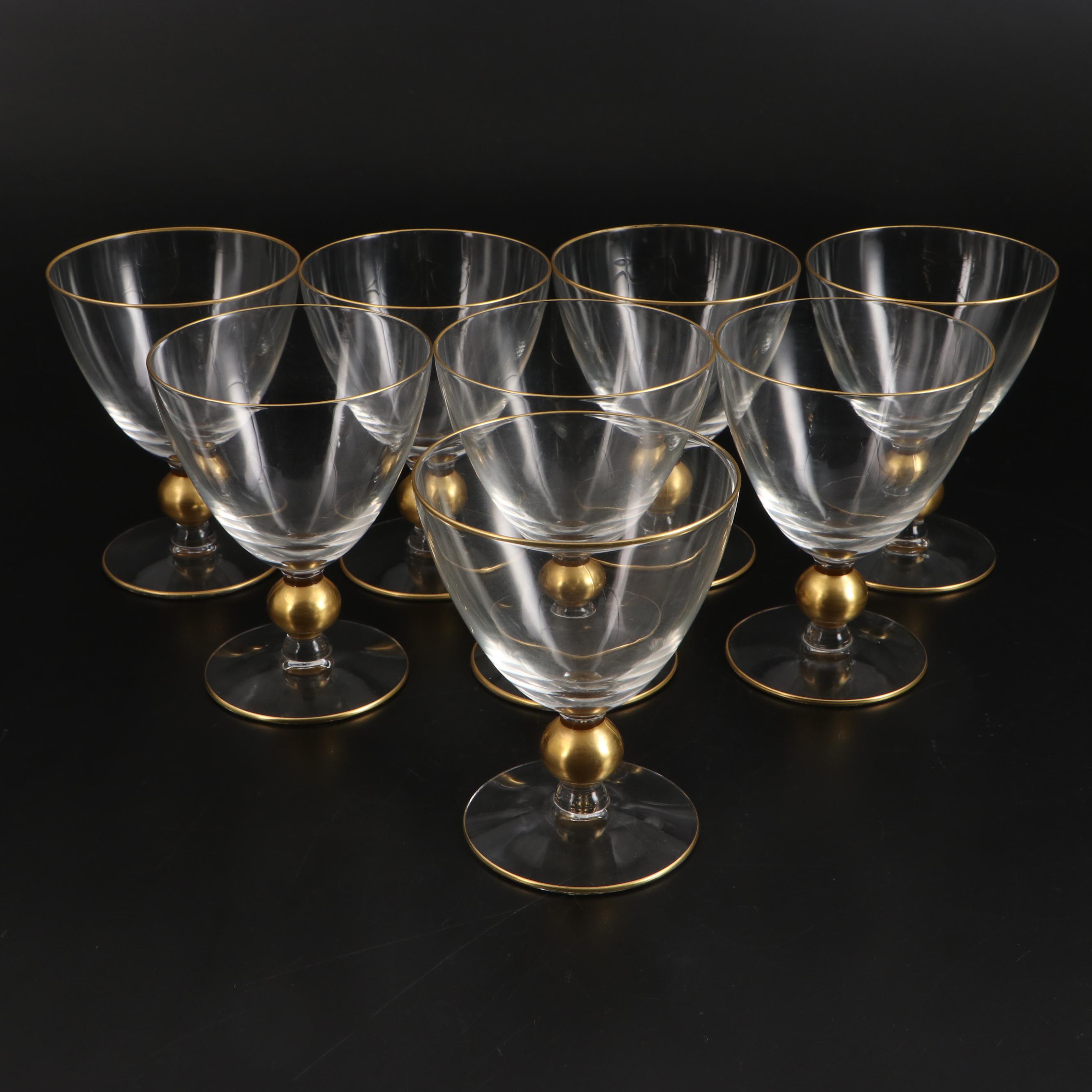 Gold Rimmed Glass Plates with Wine and Champagne Glasses