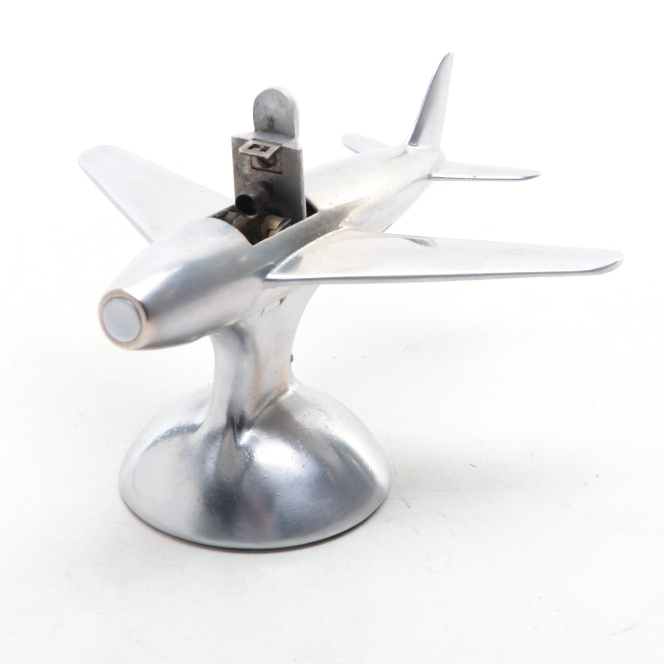 Dunhill Chrome Airplane Table Lighter with Other Novelty Lighter and Cigar Case