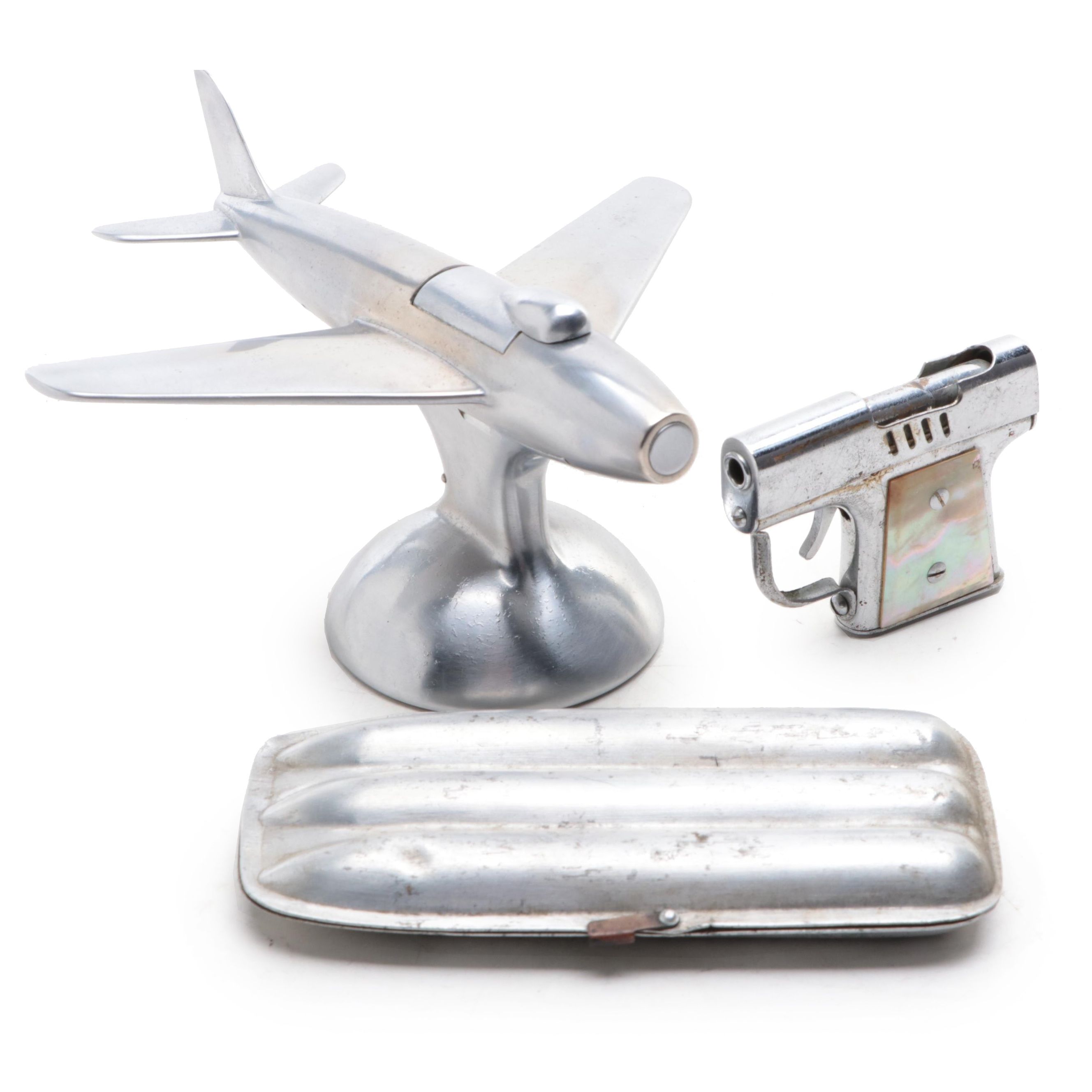 Dunhill Chrome Airplane Table Lighter with Other Novelty Lighter and Cigar Case
