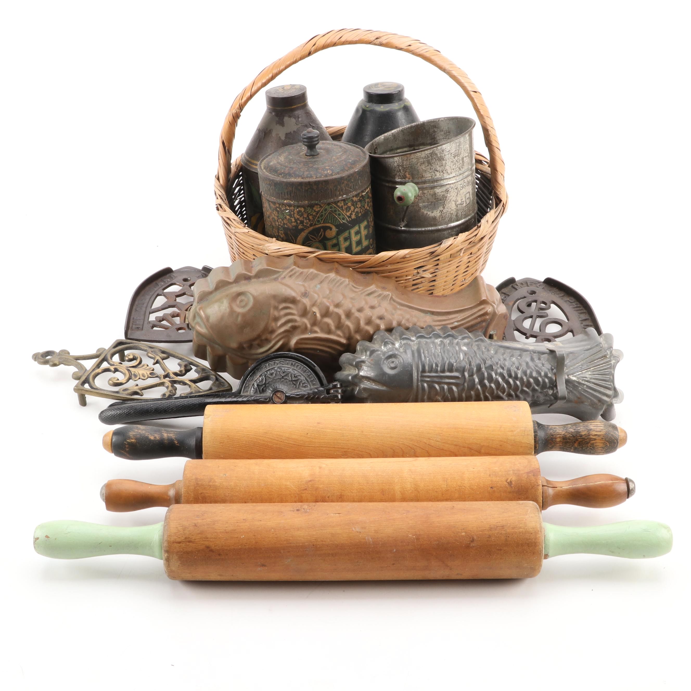 Arcade Cast Iron Lemon Squeezer with Toleware Containers and Other Kitchenware