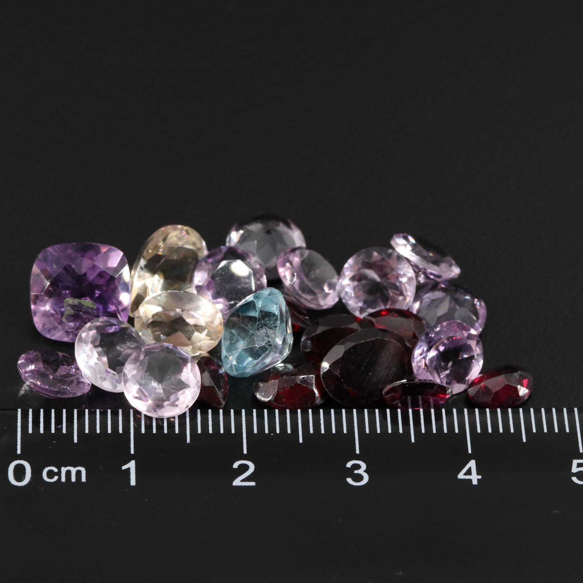 Loose 25.73 CTW Amethyst, Citrine and Garnet  Lot