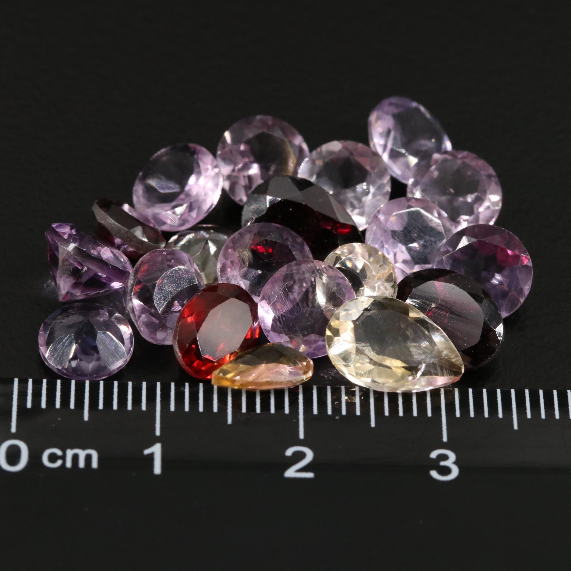 Loose 22.65 CTW Amethyst, Citrine and Garnet Lot