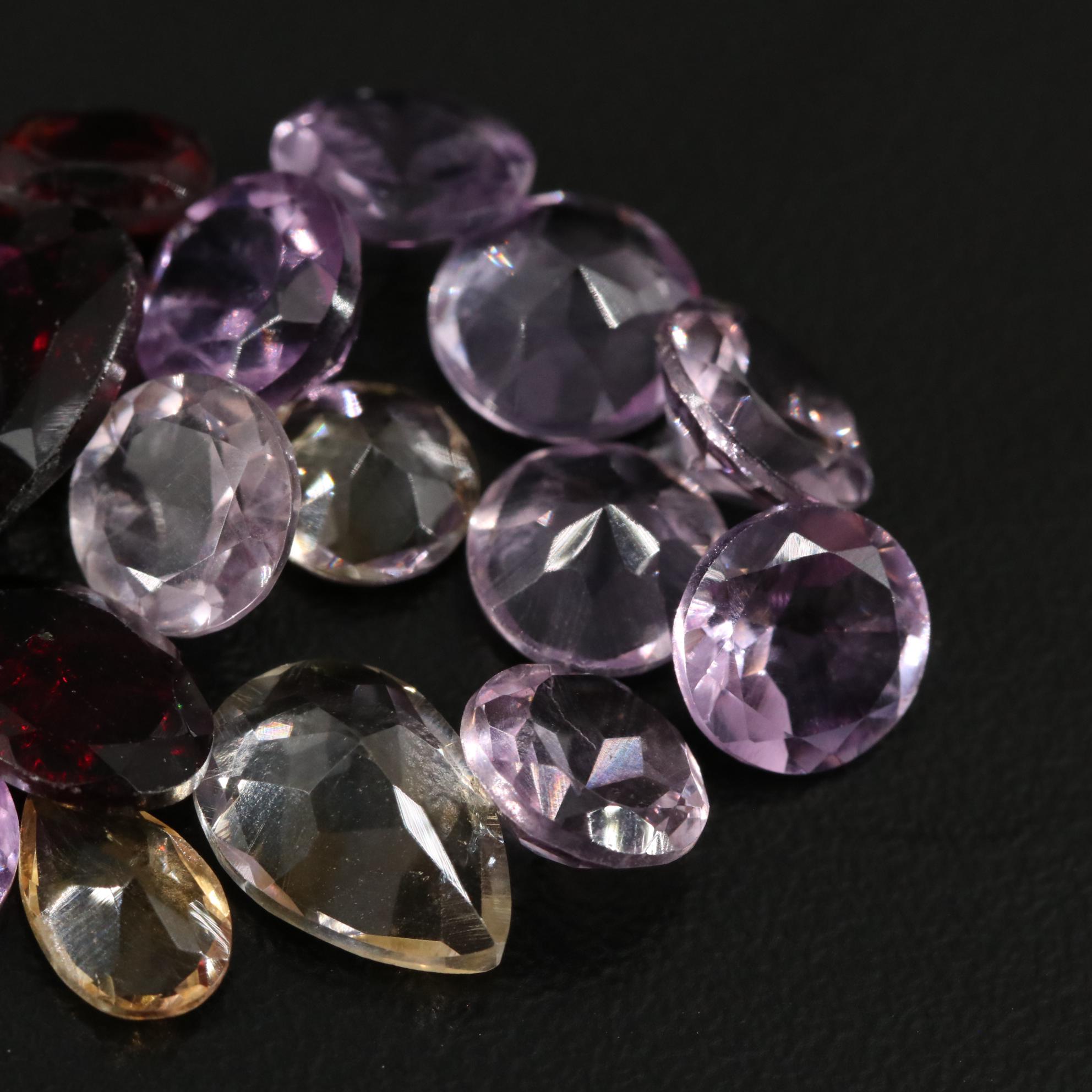 Loose 22.65 CTW Amethyst, Citrine and Garnet Lot