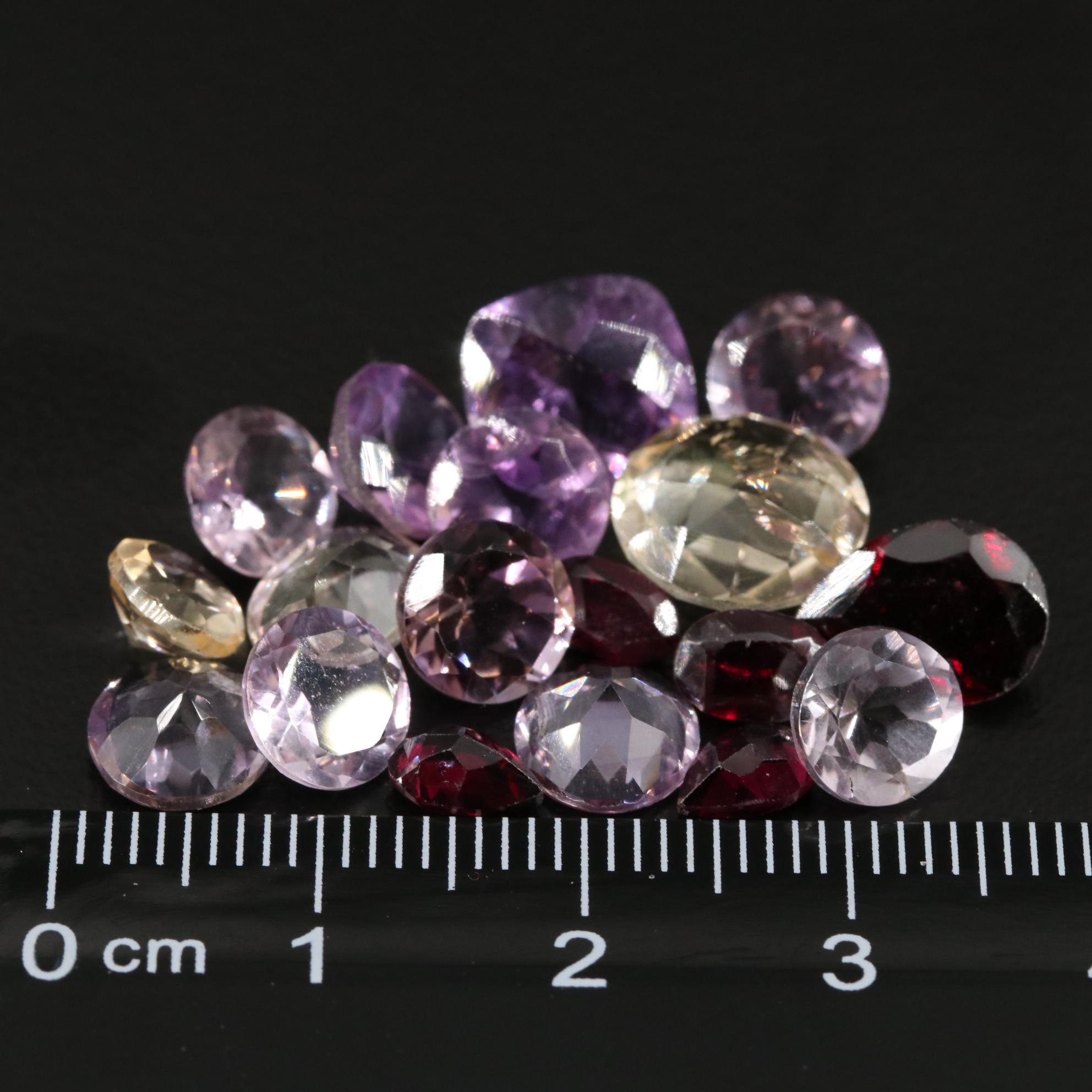 Loose 22.88 CTW Amethyst, Citrine and Garnet Lot
