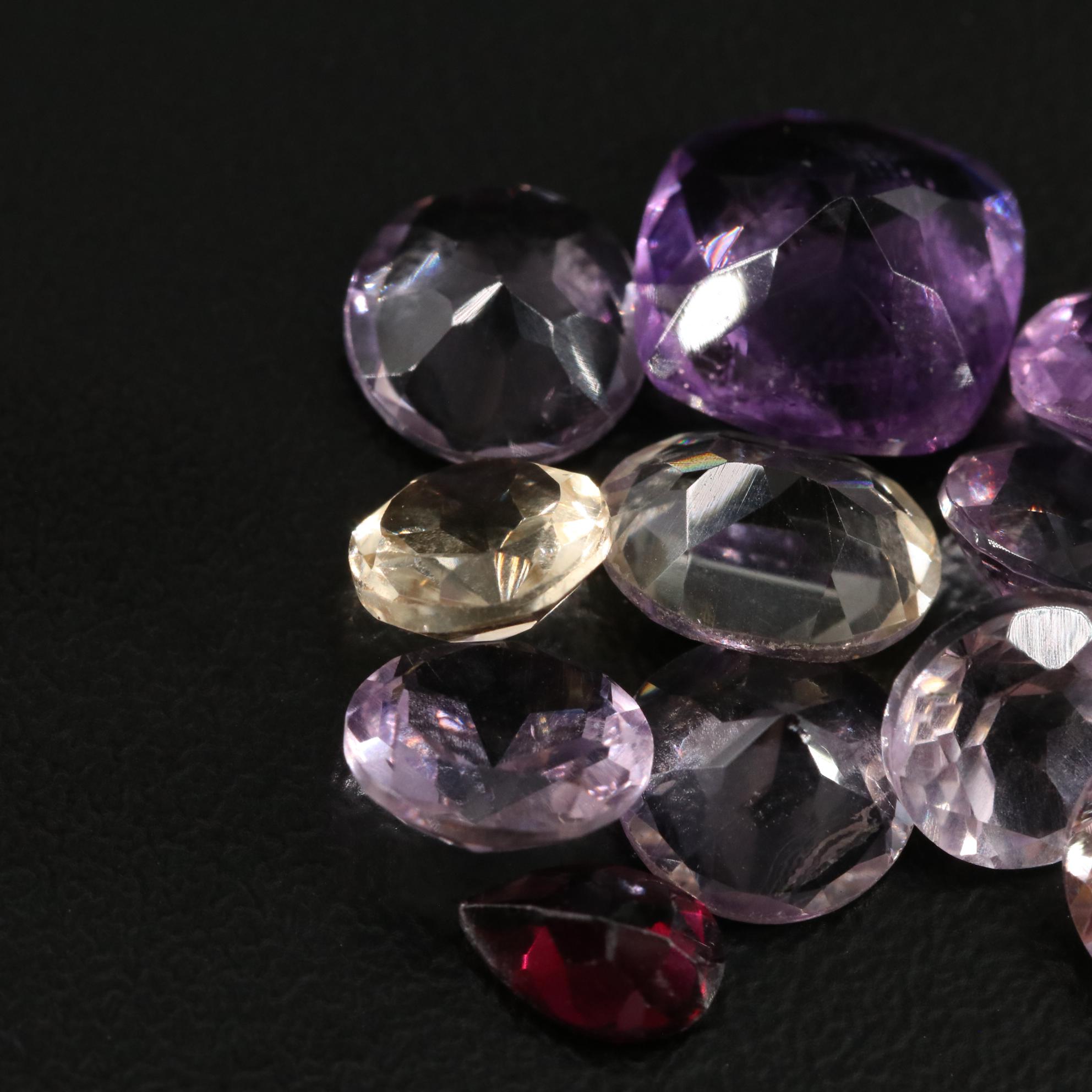 Loose 22.88 CTW Amethyst, Citrine and Garnet Lot