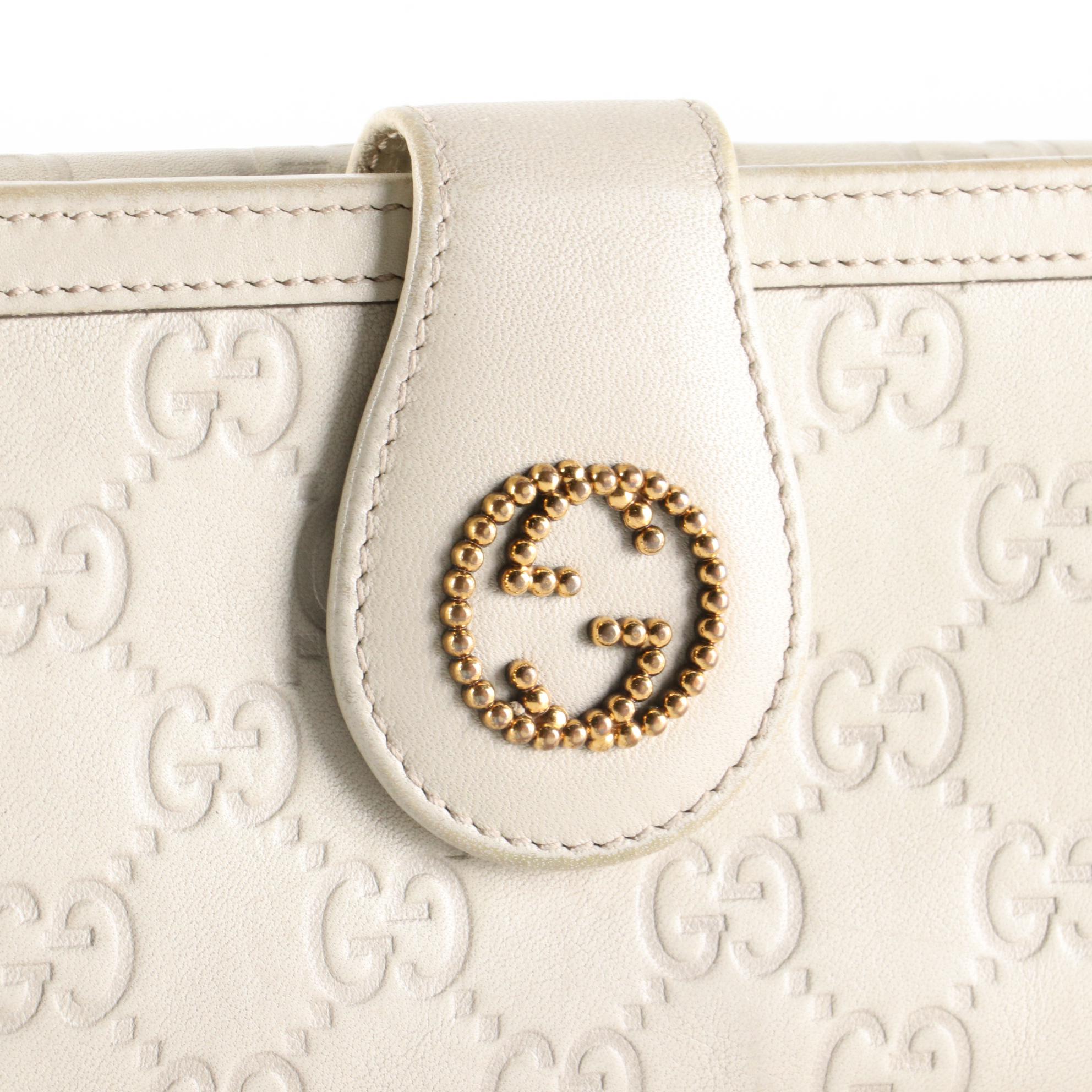 Gucci GG Embossed Leather Wallet